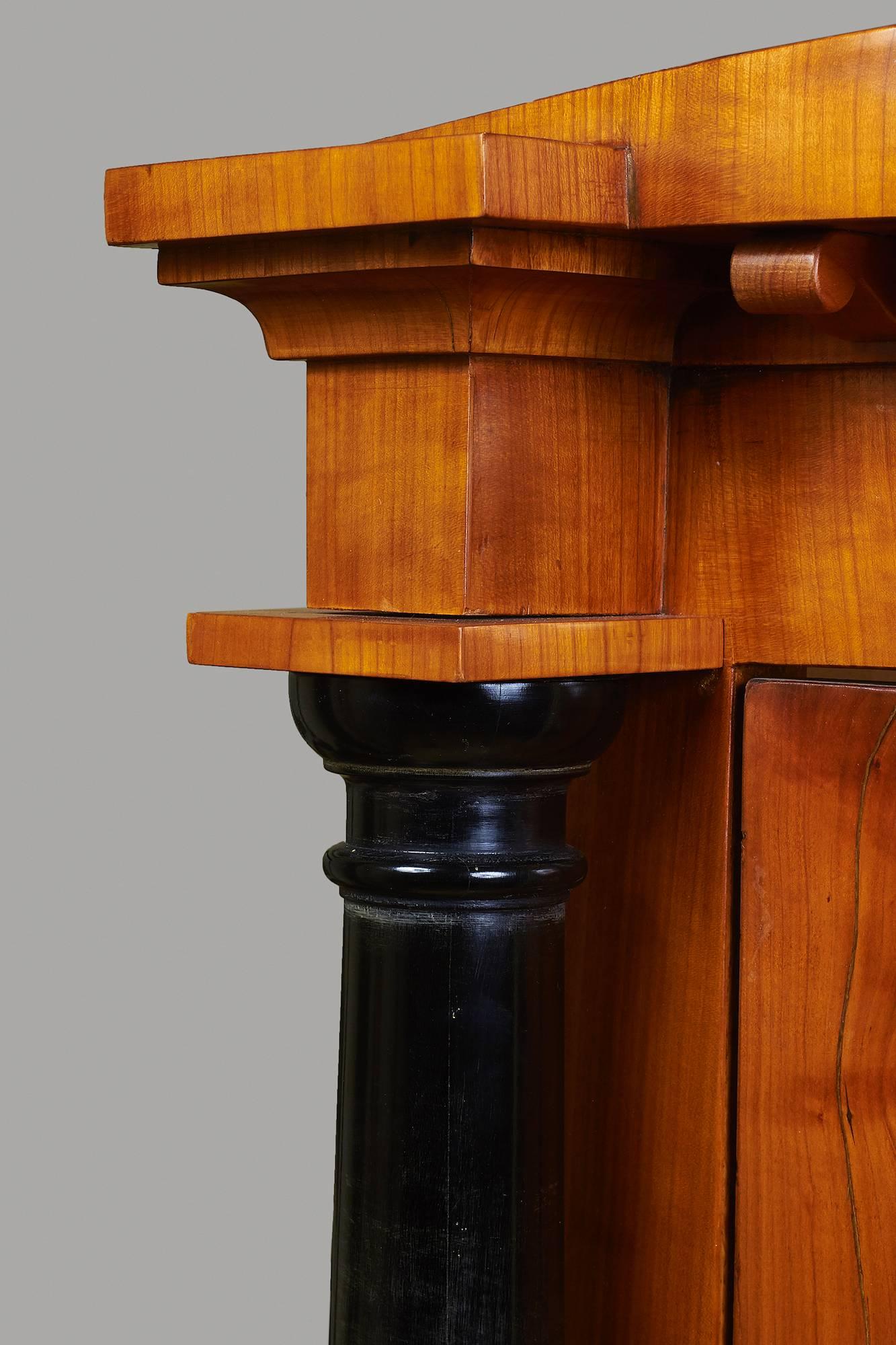 German Biedermeier Satin Birch or Fruitwood Corner Cabinet with Ebonized Columns