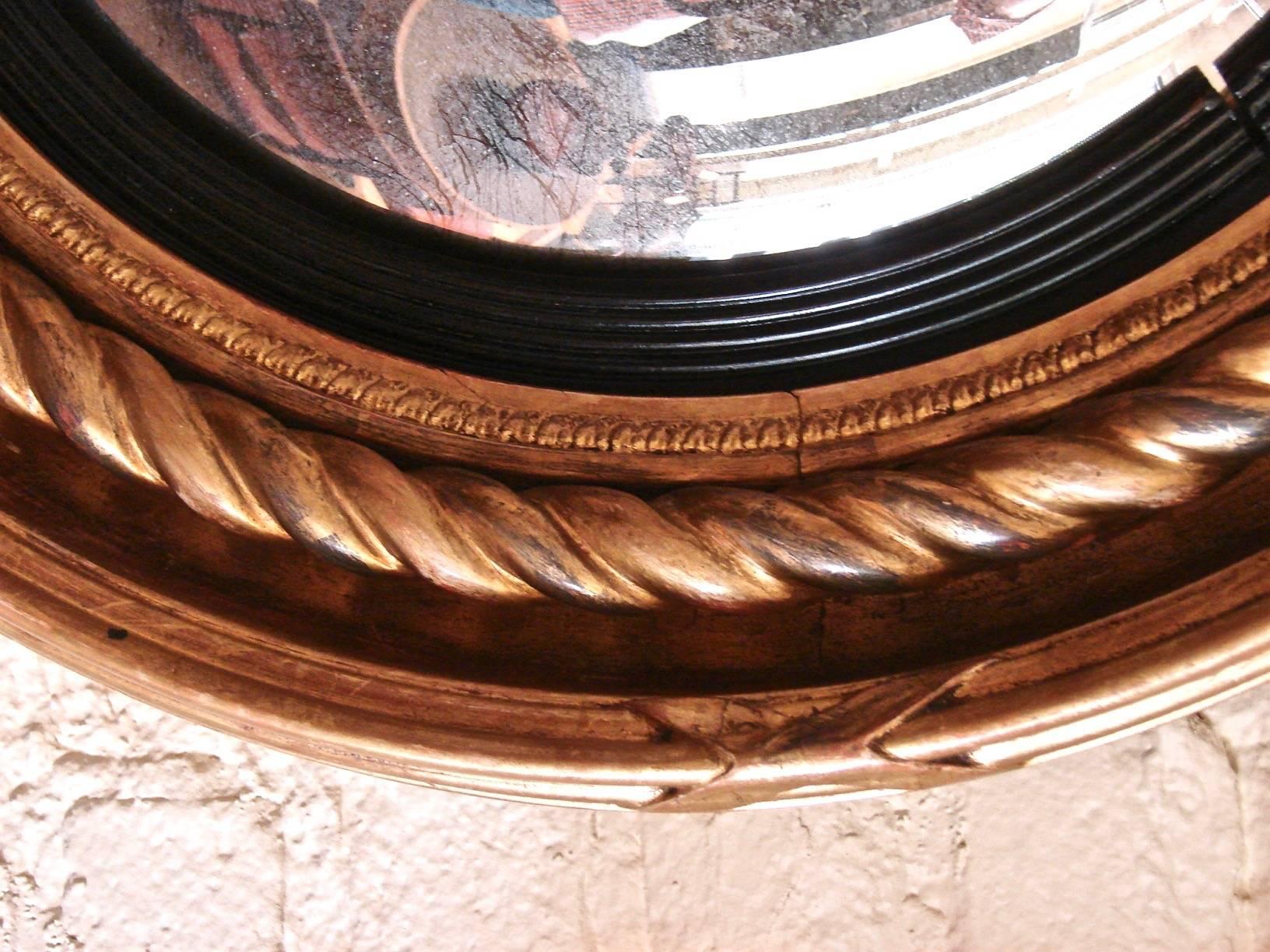 19th Century Regency Giltwood Bullseye Mirror with Eagle Cresting