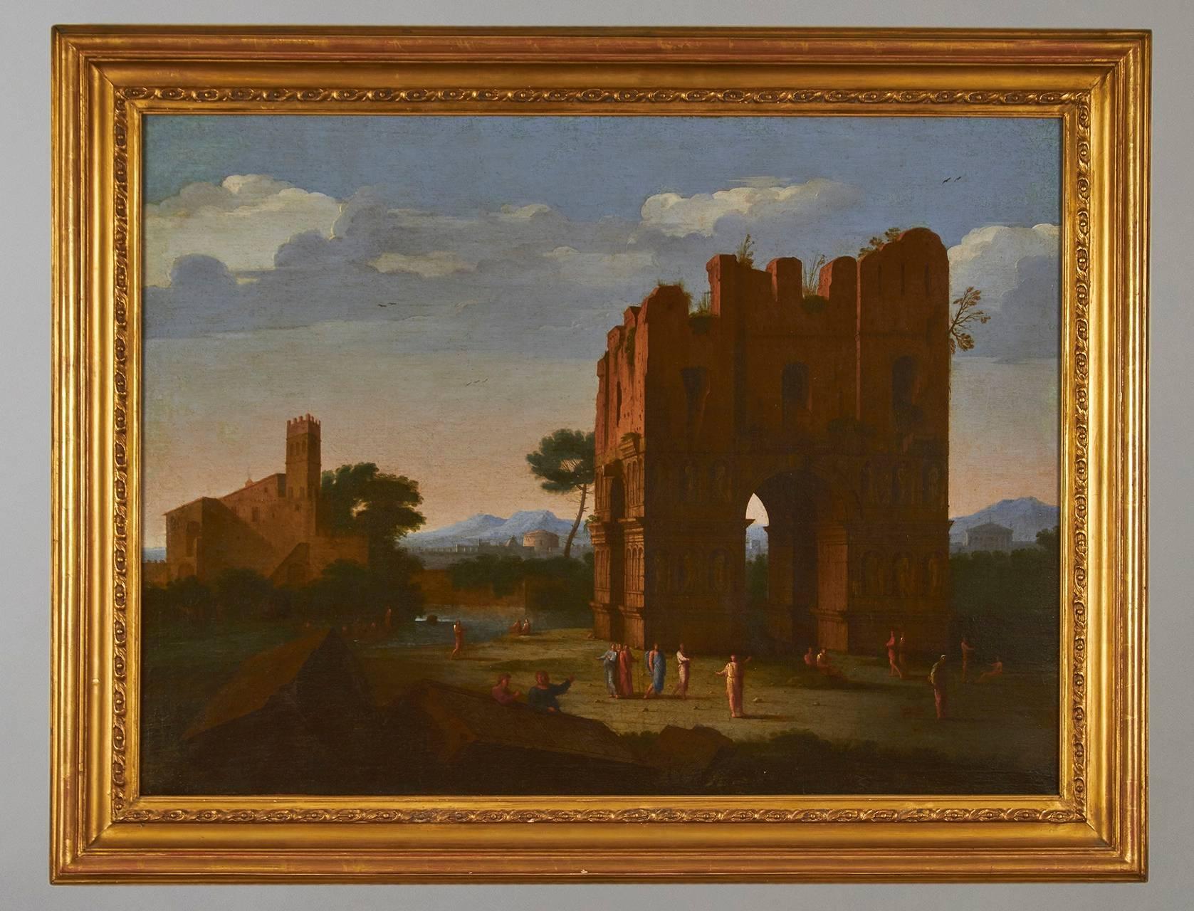 A fine pair of 18th century or earlier Continental classical landscapes in the manner of Giovanni Paolo Pannnini (b. Piacenza 1691, d. Rome 1765). Elaborate unconfirmed provenance on verso of paintings with attribution to Claude Lorrain. Old