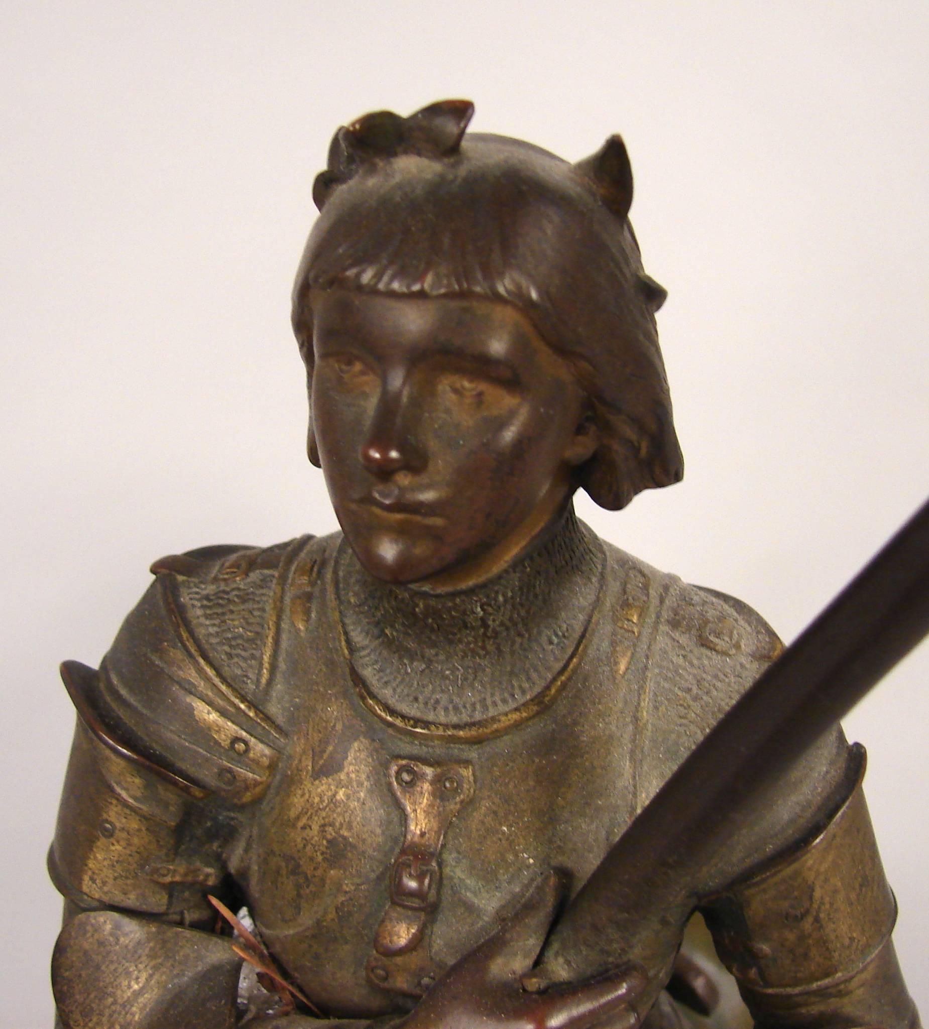 A good quality detailed and well-cast bronze made and signed by Marius Jean Antonin Mercie (French 1845-1916) depicting a horse and armored female rider (possibly Joan of Arc) carrying a standard, signed on the plinth 