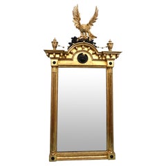 Fine Regency Giltwood Mirror with Carved Eagle Cresting and Lion's Mask Bosses