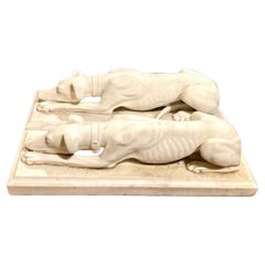Pair of Antique Continental Carved Marble Whippets on Plinths
