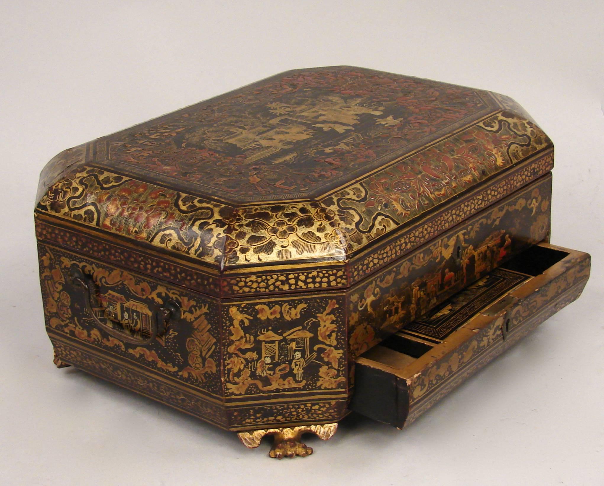A Chinese export sewing box decorated with scenes of figures, buildings and flowers complete with sewing accessories, circa 1860.
