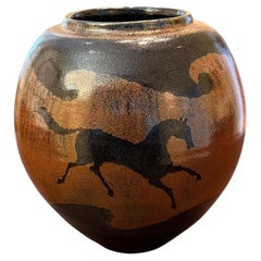 Kiyoshi Hara (Japanese b. 1936) Large Jar with Iron Glaze Equestrian Design