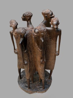 Suggestivo gruppo scultoreo di guerrieri Masai africani, intagliato a mano in legno massiccio