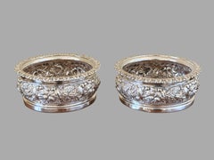Pair of Large English Regency Repousse Sterling Silver Wine Coasters Dated 1823