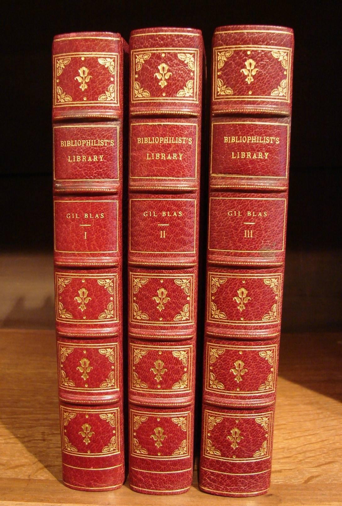 A beautiful set of 20 volumes titled The Bibliophilist's Library Second Series bound in 3/4 crushed red morocco leather containing various famous works of literature of the 18th and 19th centuries. Published on Japanese vellum paper by George