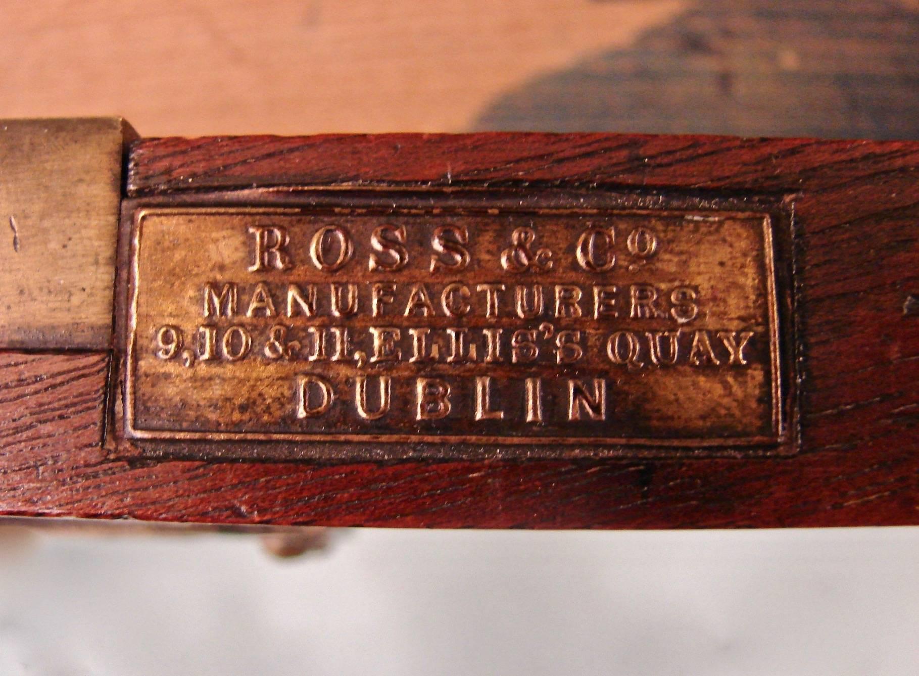 An Irish mahogany seven drawer Campaign chest in two parts, the top with whale's tail brass inlaid corners above four short drawers and one long drawer, the lower case with two long drawers, all resting on turned feet. Made and signed by Ross and