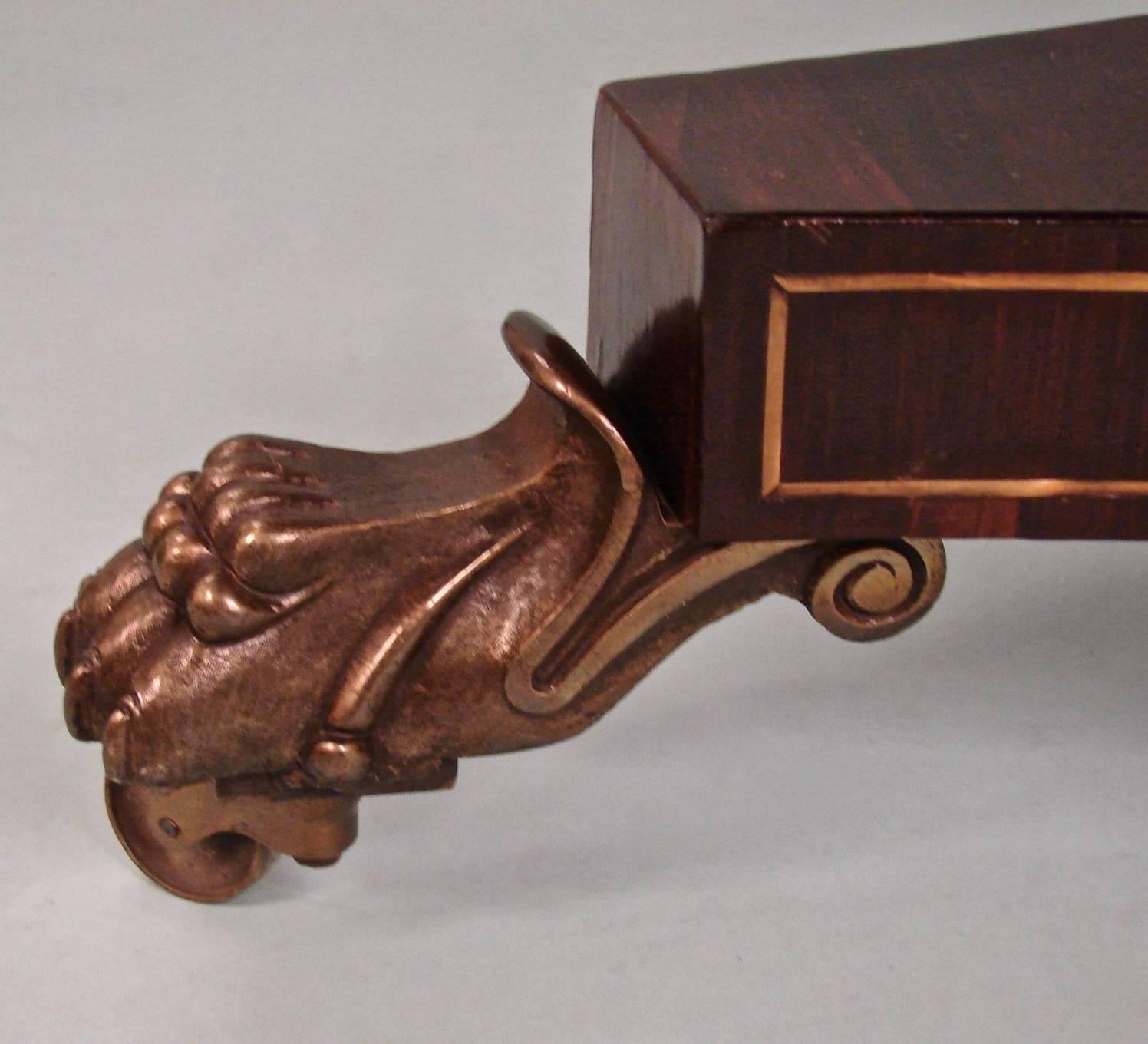 19th Century Regency Brass-Inlaid Center Table with Triangular Base and Animal Paw Feet