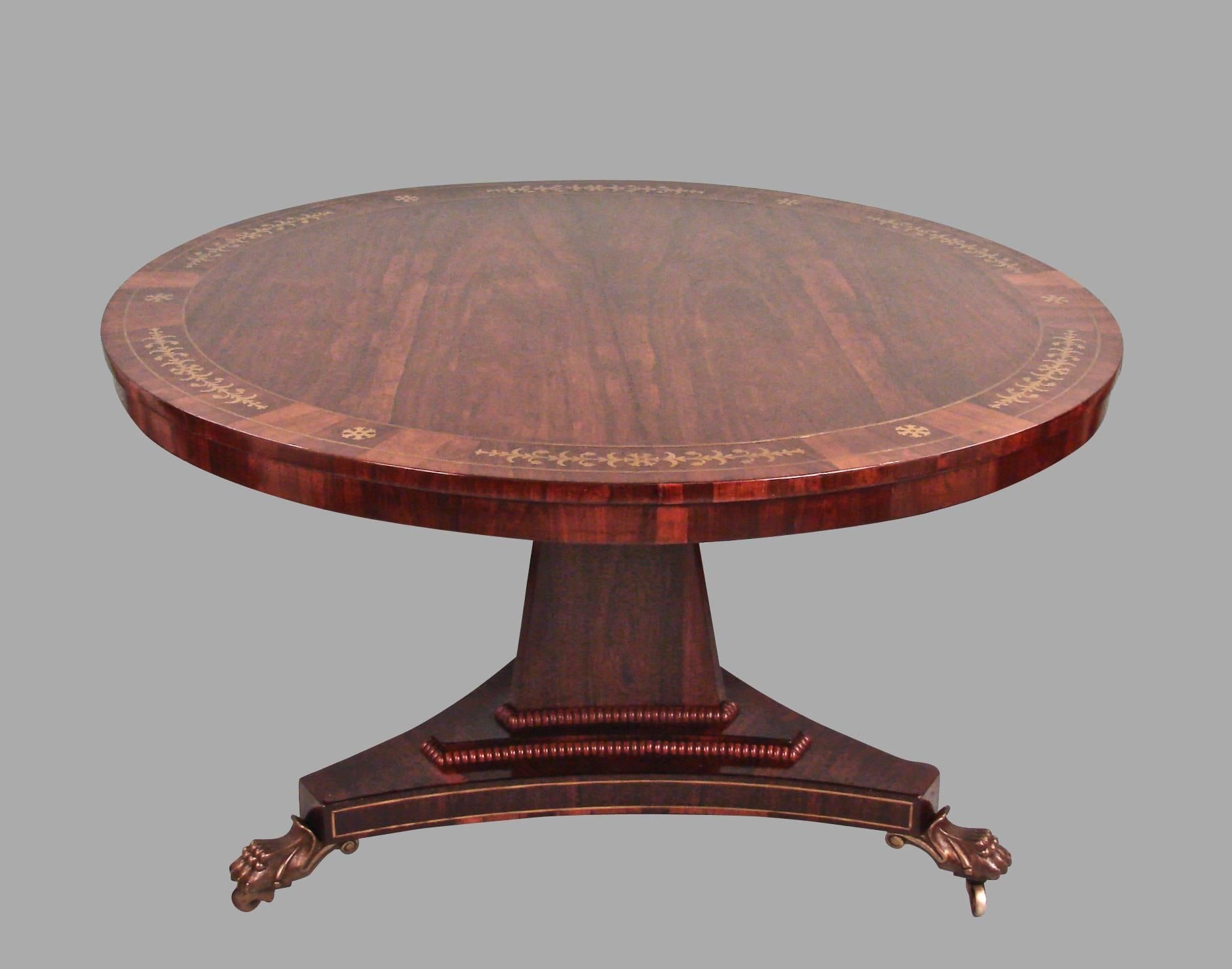 English Regency Brass-Inlaid Center Table with Triangular Base and Animal Paw Feet