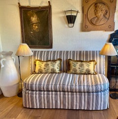 A pair of pillows made with Michael S. Smith's "Indian Flower" patterned linen