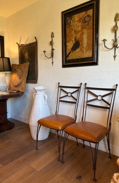 Pair of Neoclassical Versace-style brass Medusa and lion head sconces