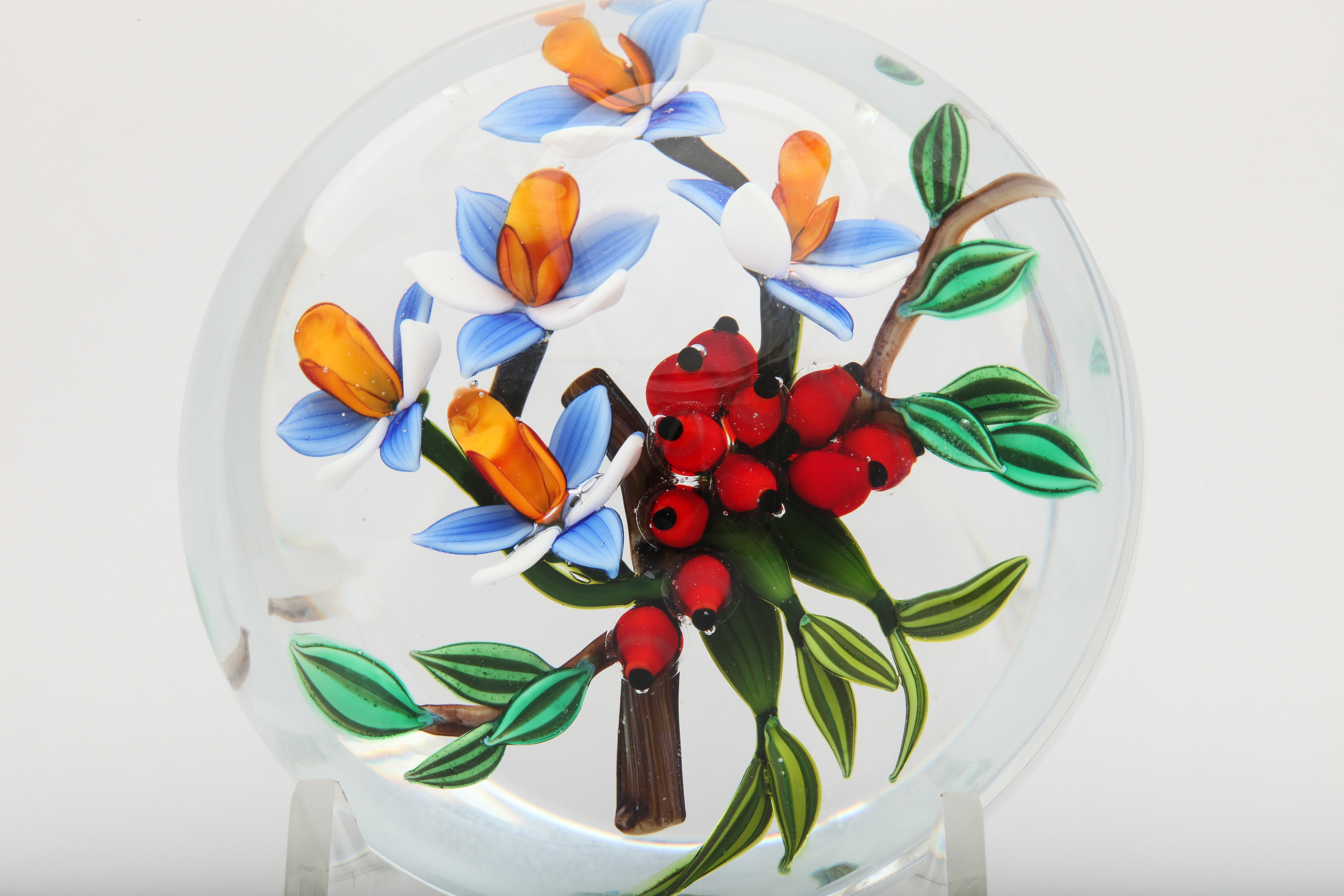 A beautiful Colin Richardson bouquet paperweight with blue, yellow and white orchids and red berries, signed Colin Richardson, 2015, 1/1