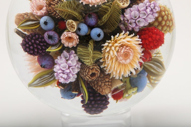 A beautiful David Graeber floral bouquet orb with mums, lilacs, tea roses, pine combs raspberries, blackberries, blueberries and other assorted flowers and berries, signed G 2015.