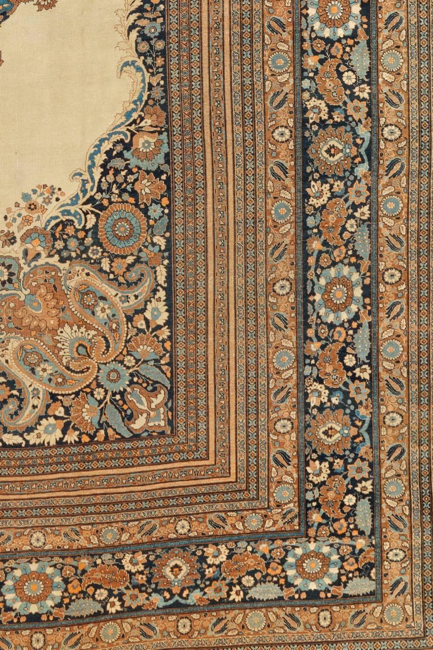 Hand-Woven Late 19th Century Tan Tabriz Carpet with Rosettes and Paisleys For Sale