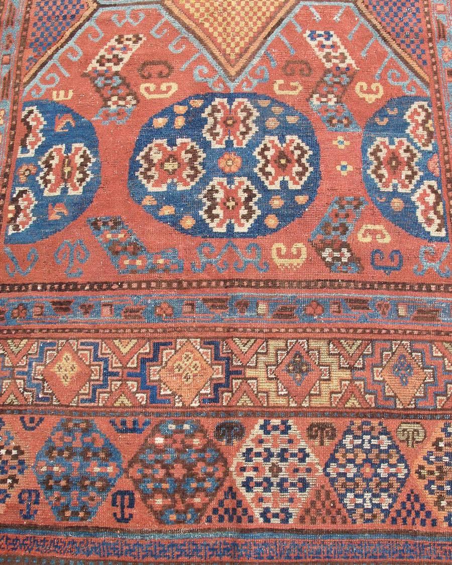 East Turkestani Early 19th Century Red and Blue Khotan Carpet