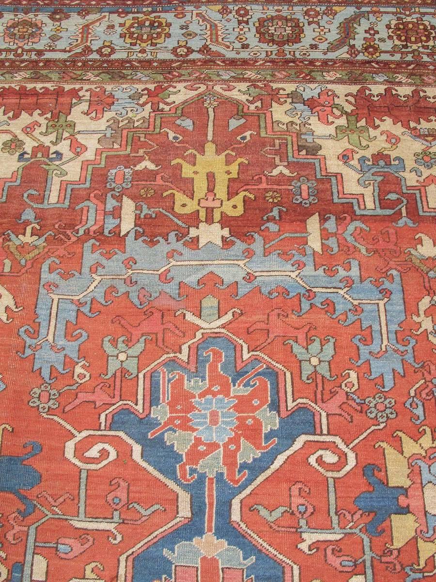 Though woven near the turn of the century, this dynamic Serapi carpet preserves elements of drawing which are centuries earlier. In many ways, it demonstrates the link between Northwest Persian traditions and weaving in the neighboring Caucasus. A