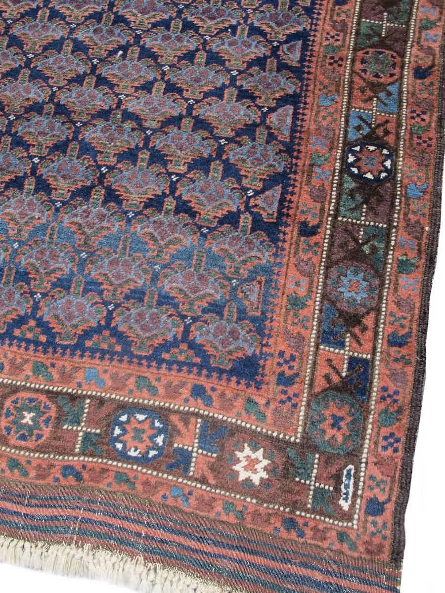 Among the various Baluch weaving groups of eastern Iran and western Afghanistan, repeat shrub patterns of several types were quite popular. Generally, these shrub designs were confined to smaller format pieces such as bagfaces and scatter rugs. This