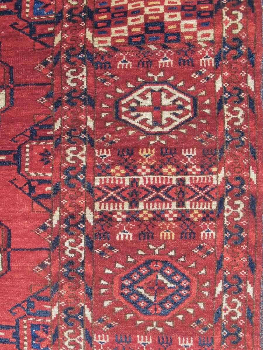 Hand-Woven Late 19th Century Madder Red Tekke Carpet