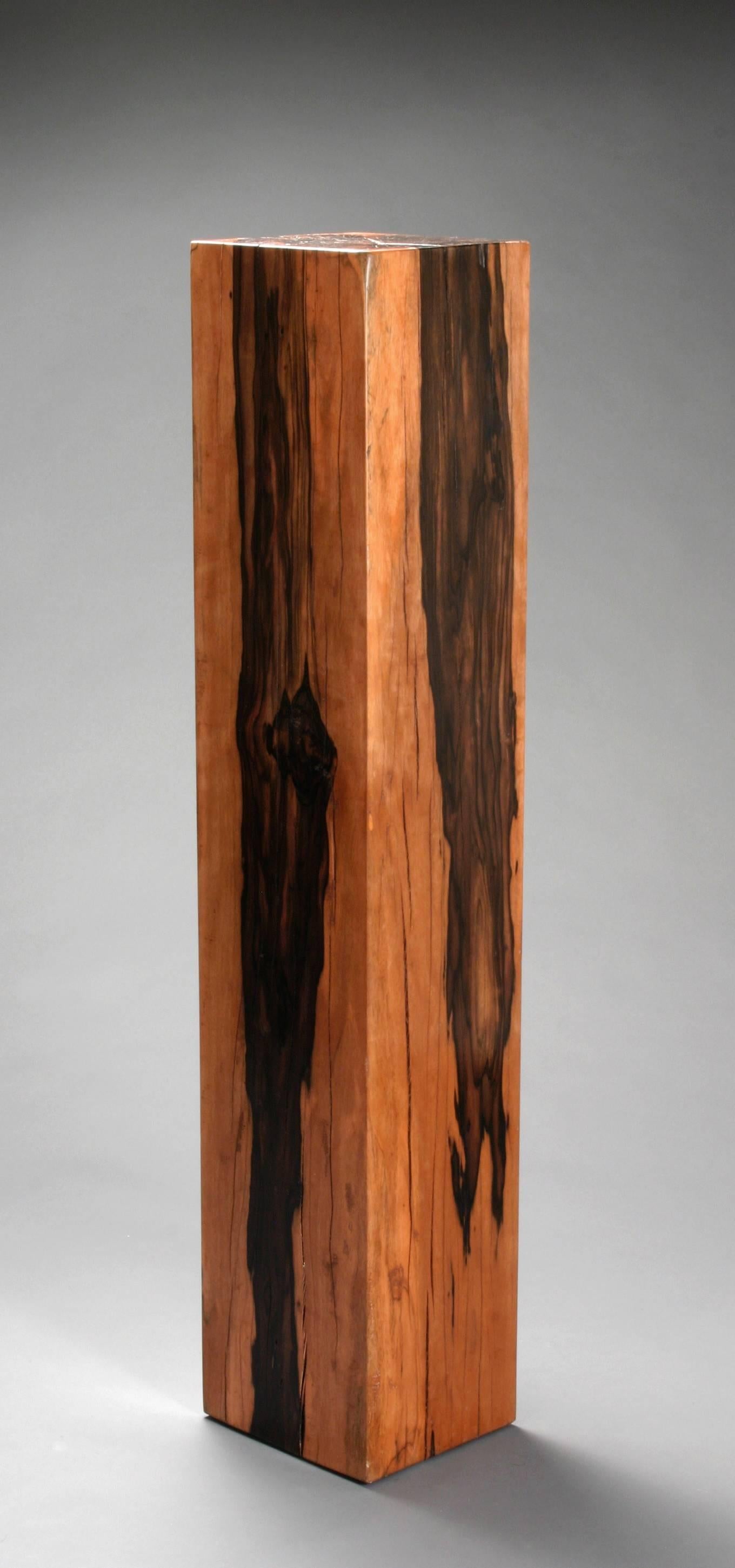The square columnar form with typical robust variegated yellow and chocolate color. Macassar, the most colorful ebony, is easily identified by its dramatic pattern, its density and its ability to take on a lustrous finish.  