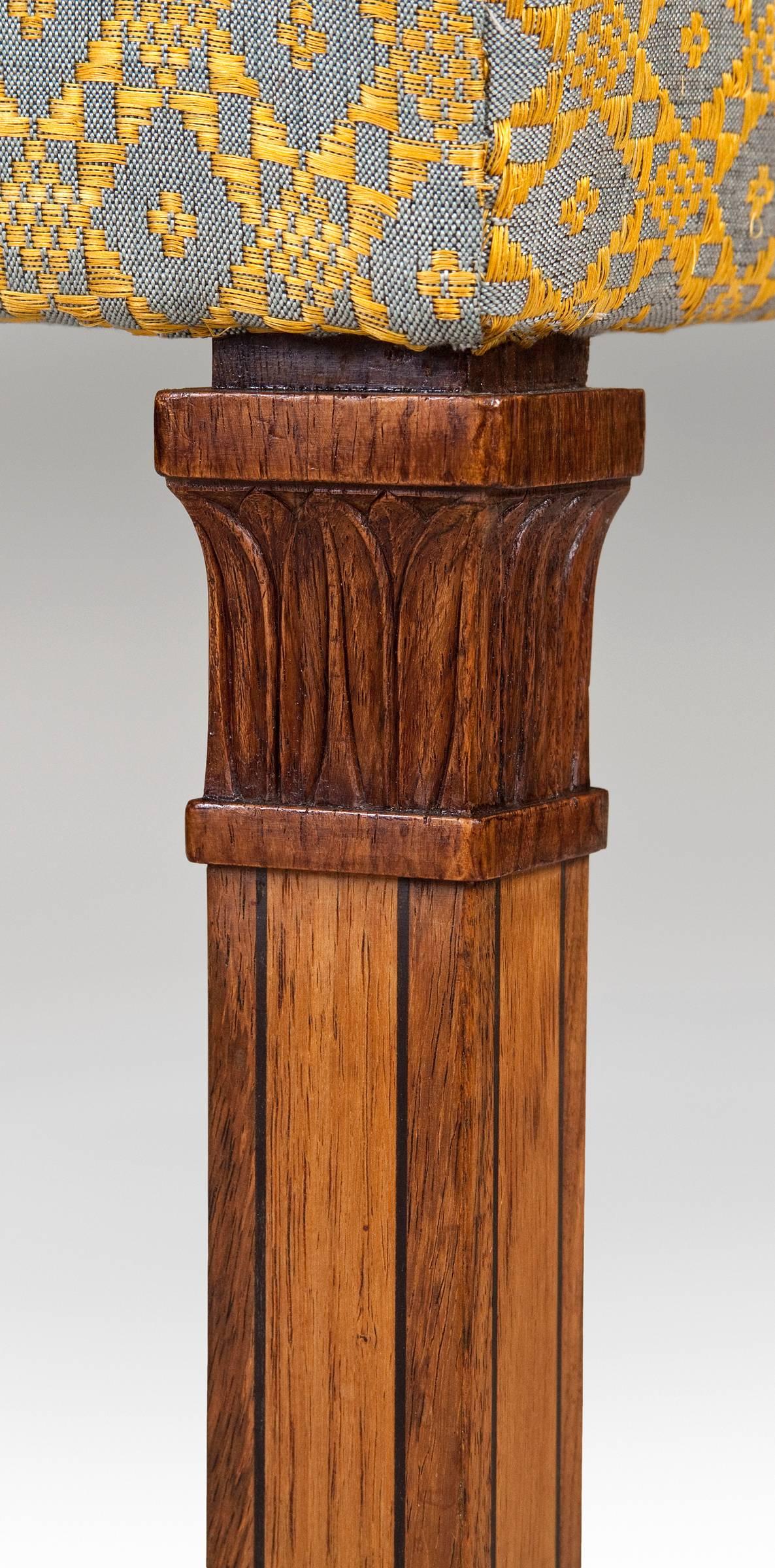 Carl Malmsten Attributed, a Swedish Grace Period Rosewood Stool
A classic example of the sophistication and quality of Swedish Grace design. The upholstered rectangular seat, raised on four square legs with panel reserves and headed by carved