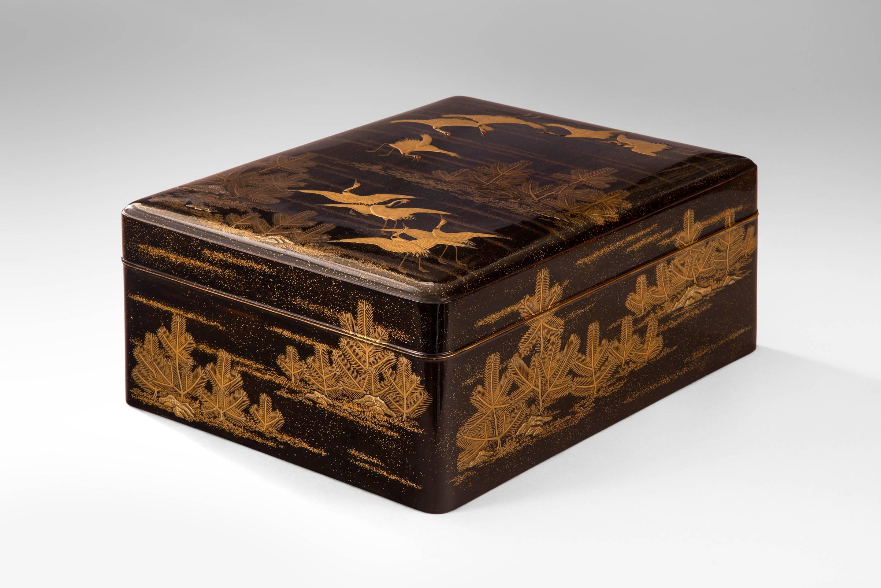 A Large Japanese Gold Lacquer Box (Bunko) Depicting Cranes and Pine Trees In Good Condition For Sale In New York, NY