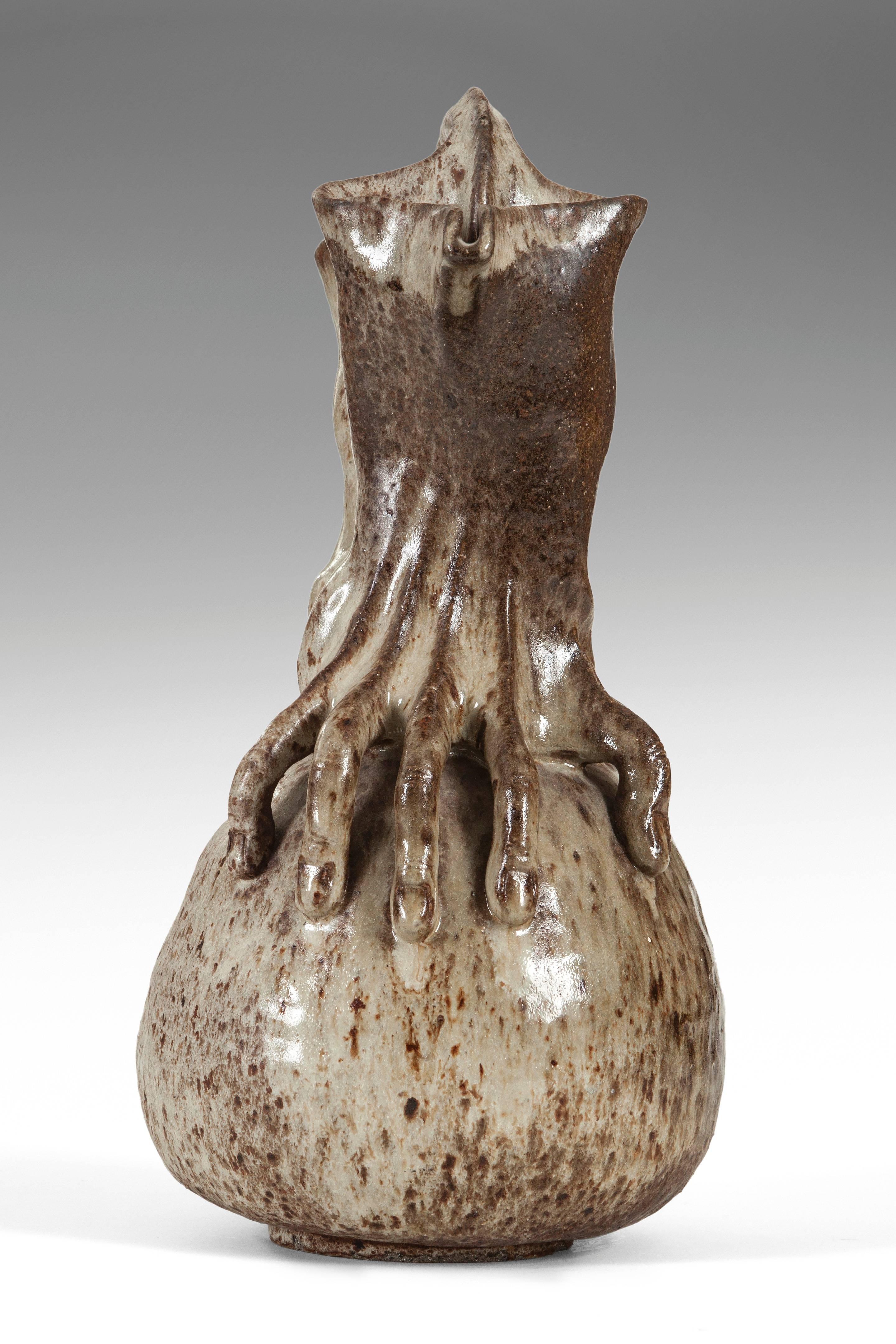 Art Nouveau A Glazed Stoneware Anthropomorphic Vase / Pitcher