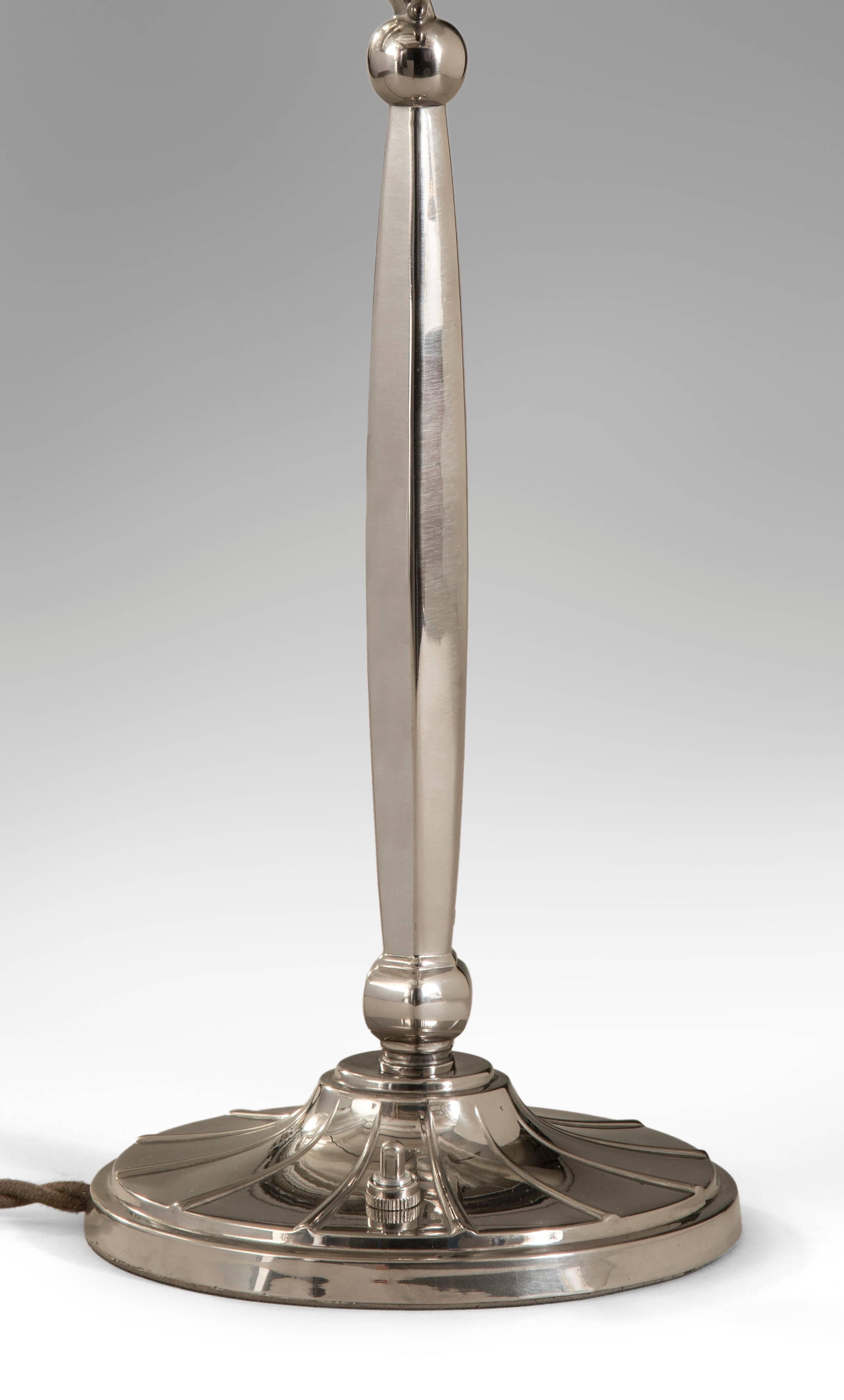 The pointed finial above a hexagonal standard, on fluted circular base. Signed on the base: C.G Hallberg.
