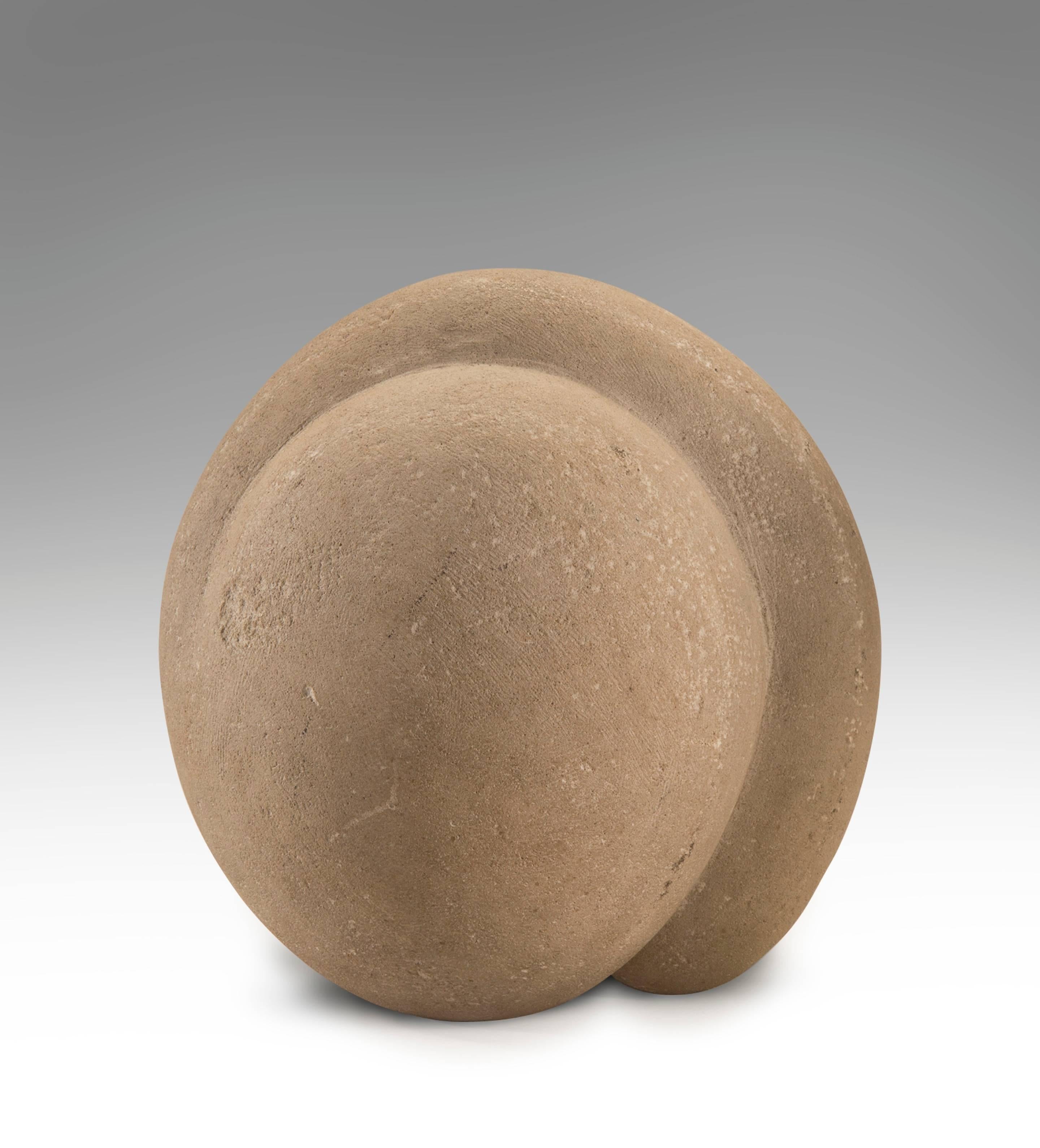 Shell-like of gently curling abstract tripartite form with a natural, soft surface.