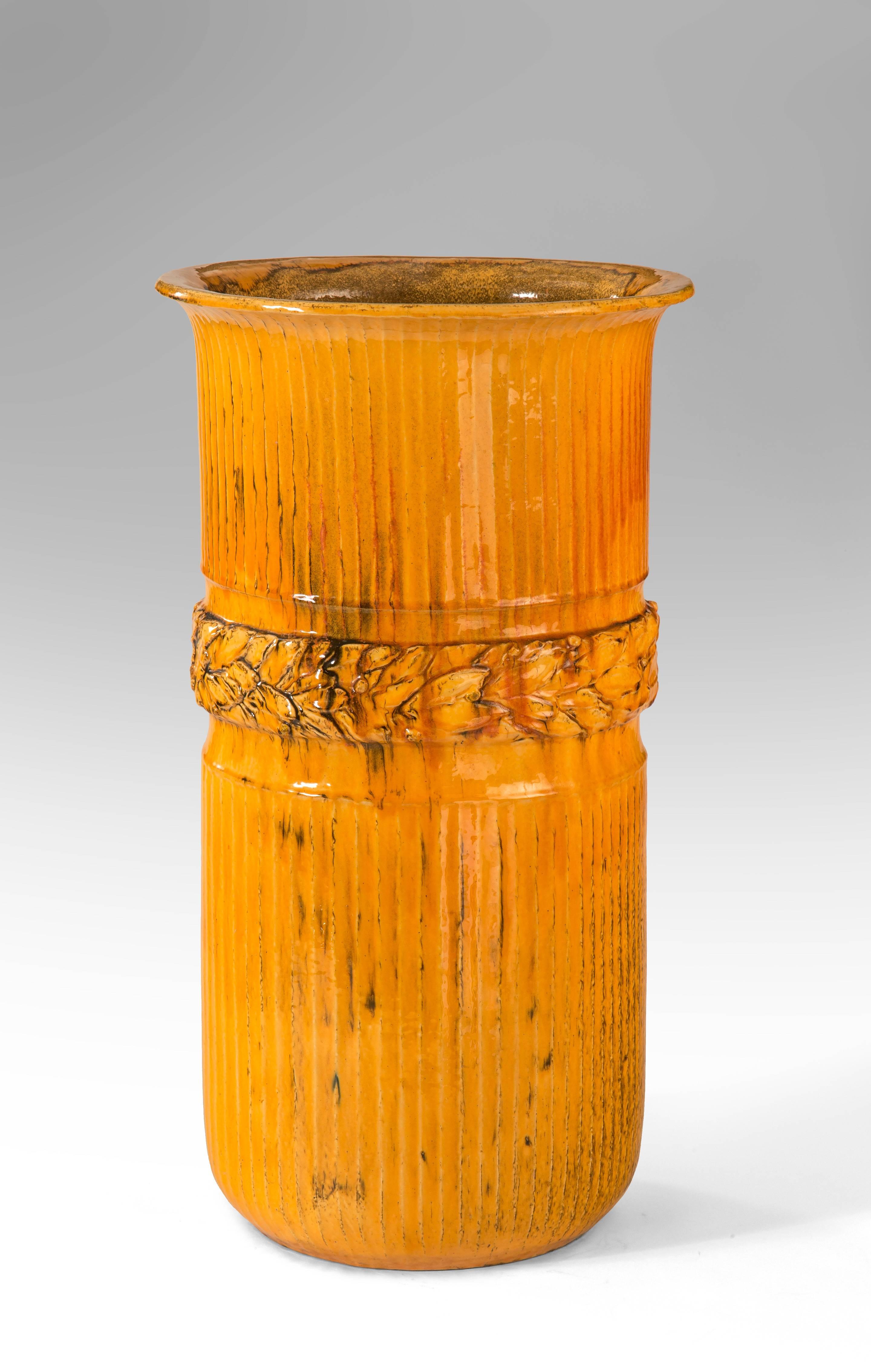 An exceptional rich glaze and scale, one the best examples we have seen. The fluted cylindrical body banded by a laurel wreath. Signed: HAK Danmark

A related vase by Hammershøi is illustrated by Peder Rasmussen, Kählers Værk, Denmark, 2002, p. 147