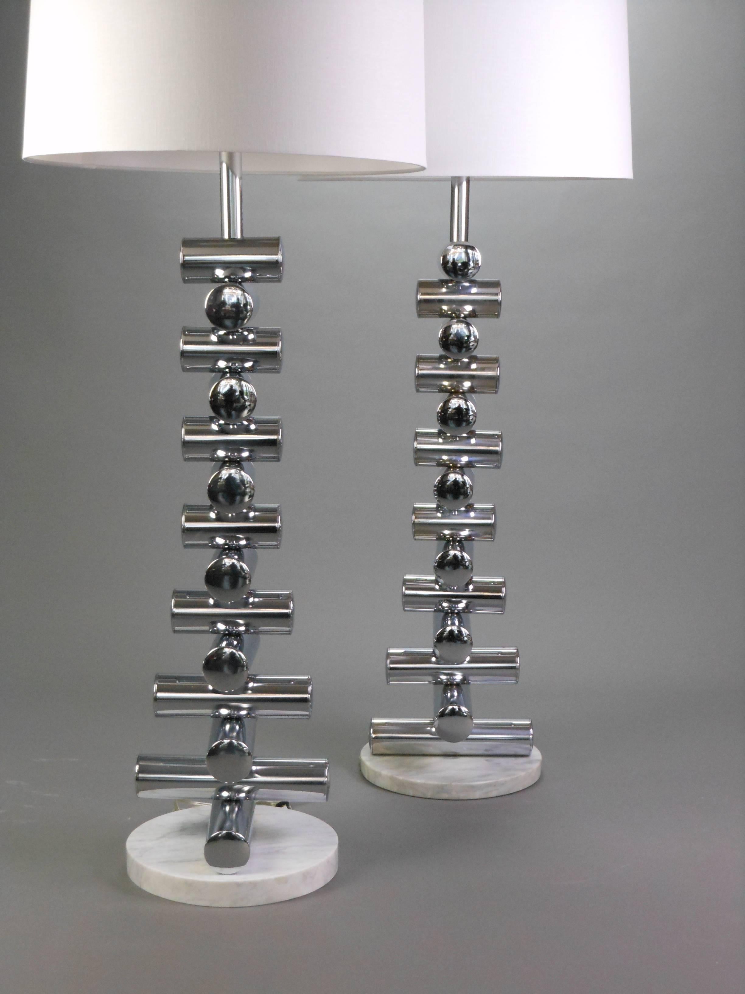 Late 20th Century A Matched Pair of Italian Steel and Marble Floor Lamps For Sale