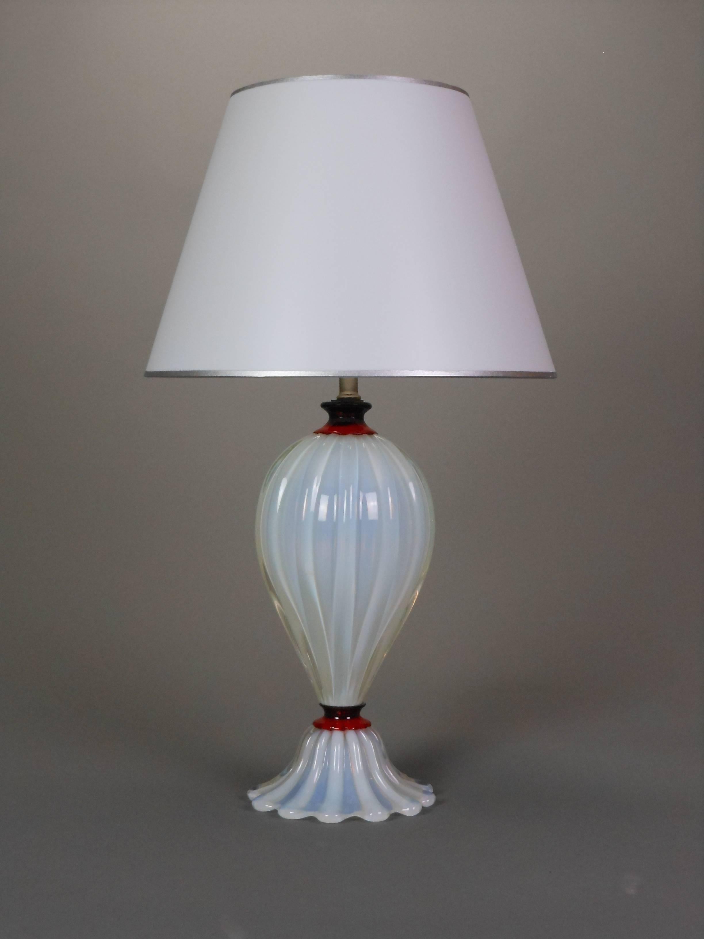 Each of fluted baluster form on domed scalloped edge bases.

Height to base of light socket: 14