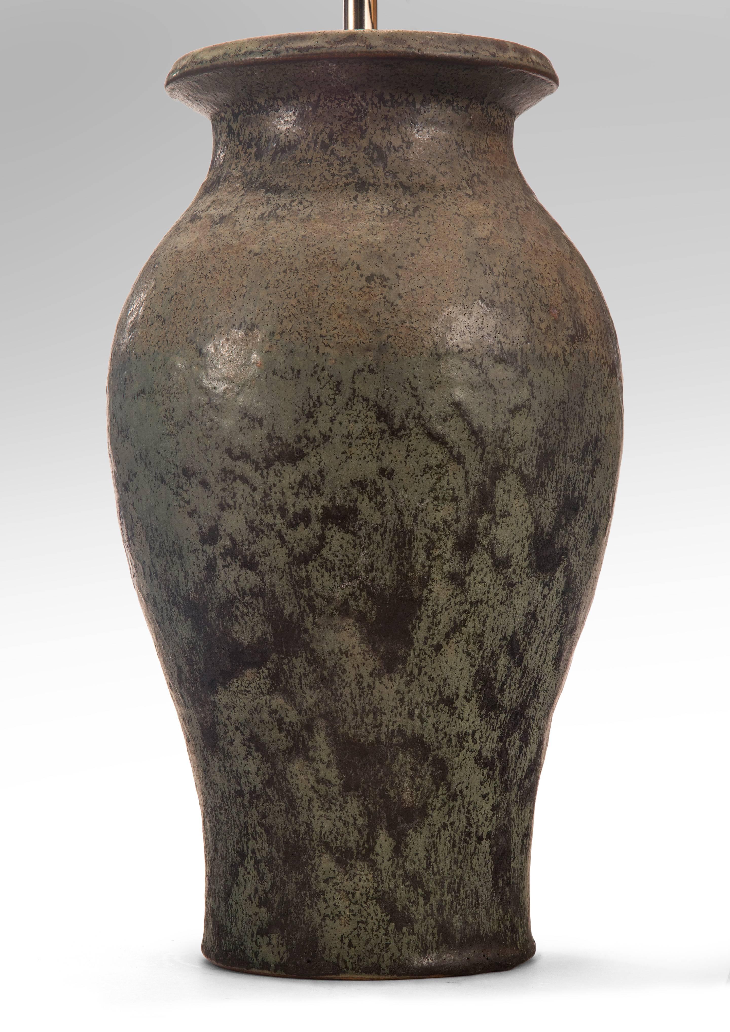 Nice large scale by this leading Danish ceramist. The baluster shaped vase with a subtle and complex variegated glaze of moss green, graphite and light brown.
Signed and dated with Nordstrøm's monogram and ISLE, 1926 2-35