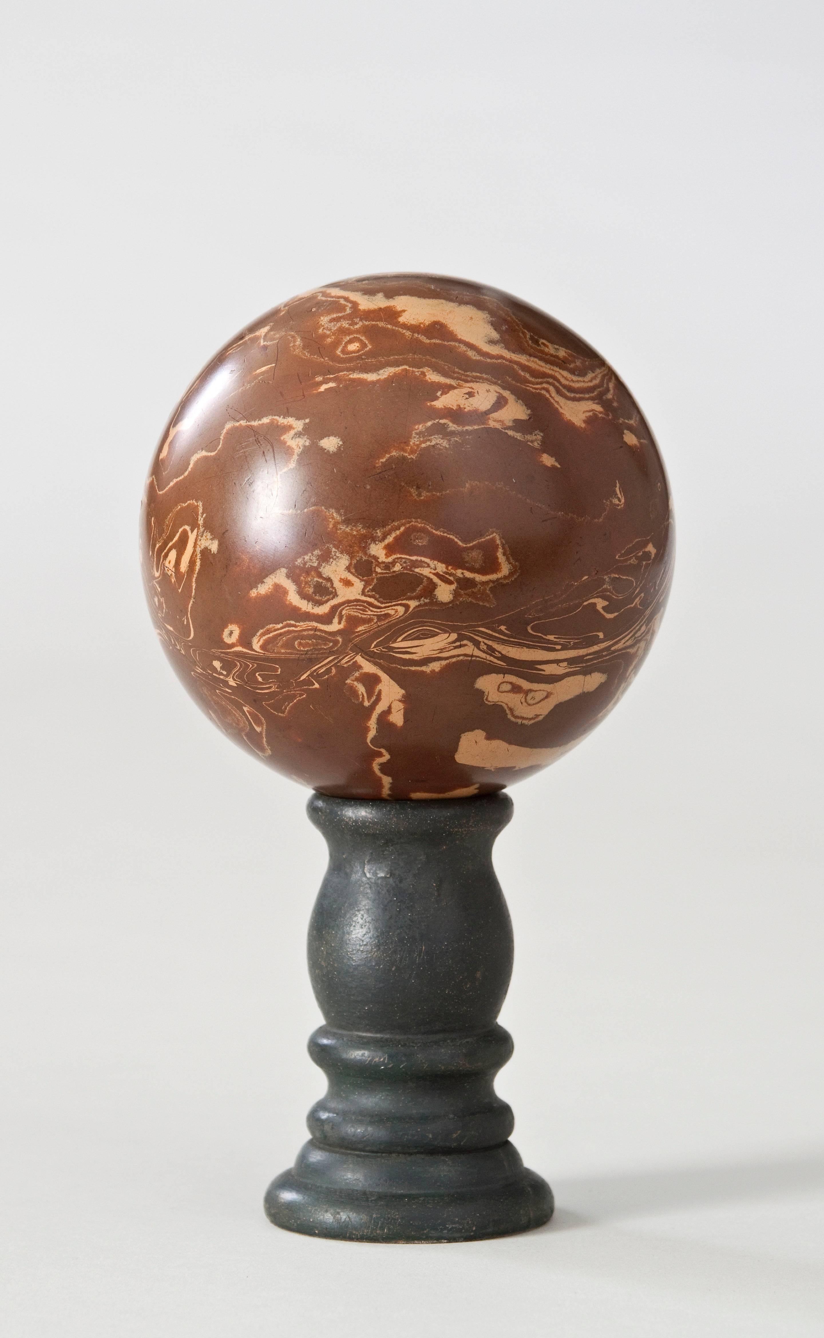 Richly marbled with brown and tan veining. Now on a stand.