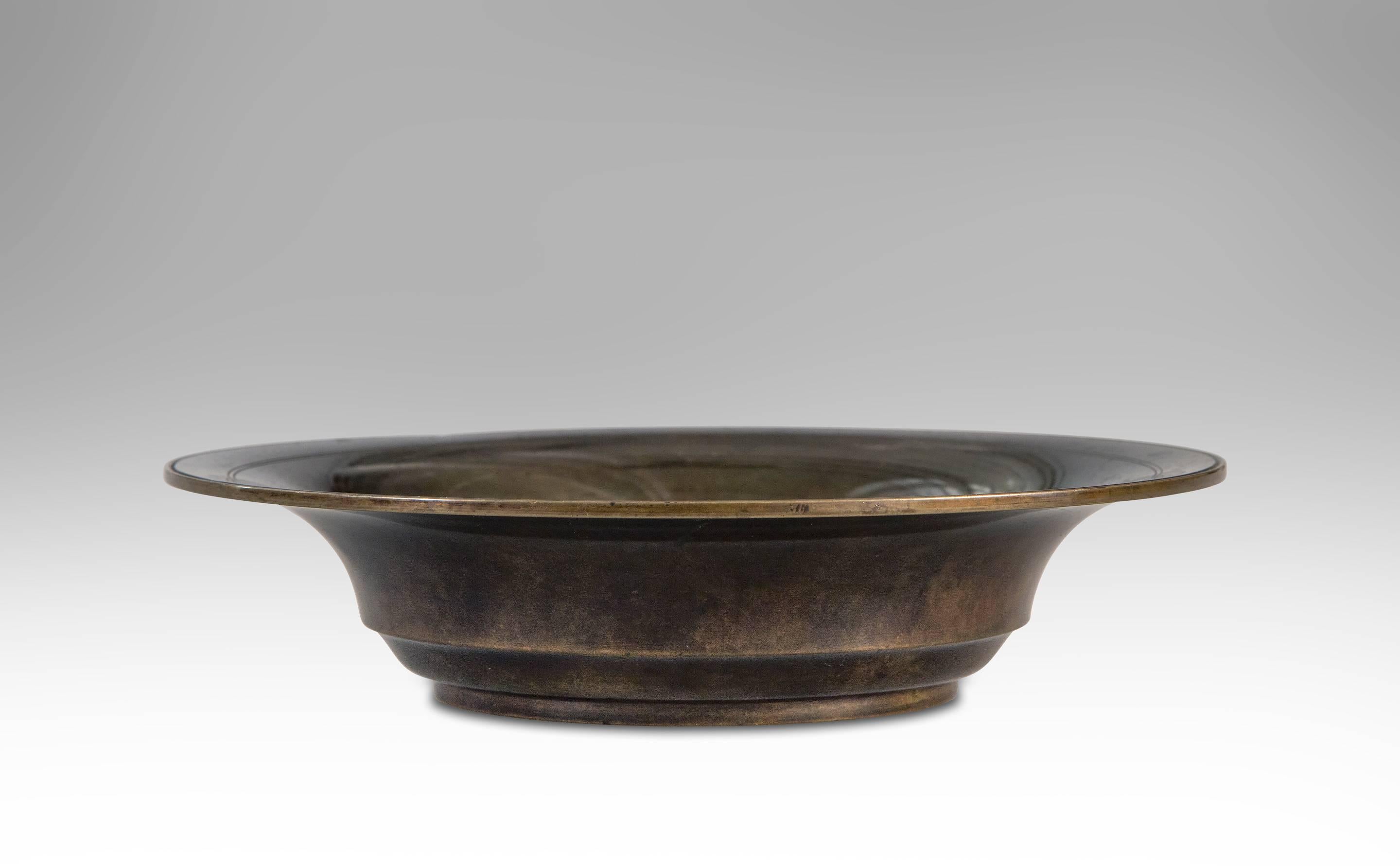 The flared lip with double-ring banding, above a molded base. Signed: JUST DENMARK B174