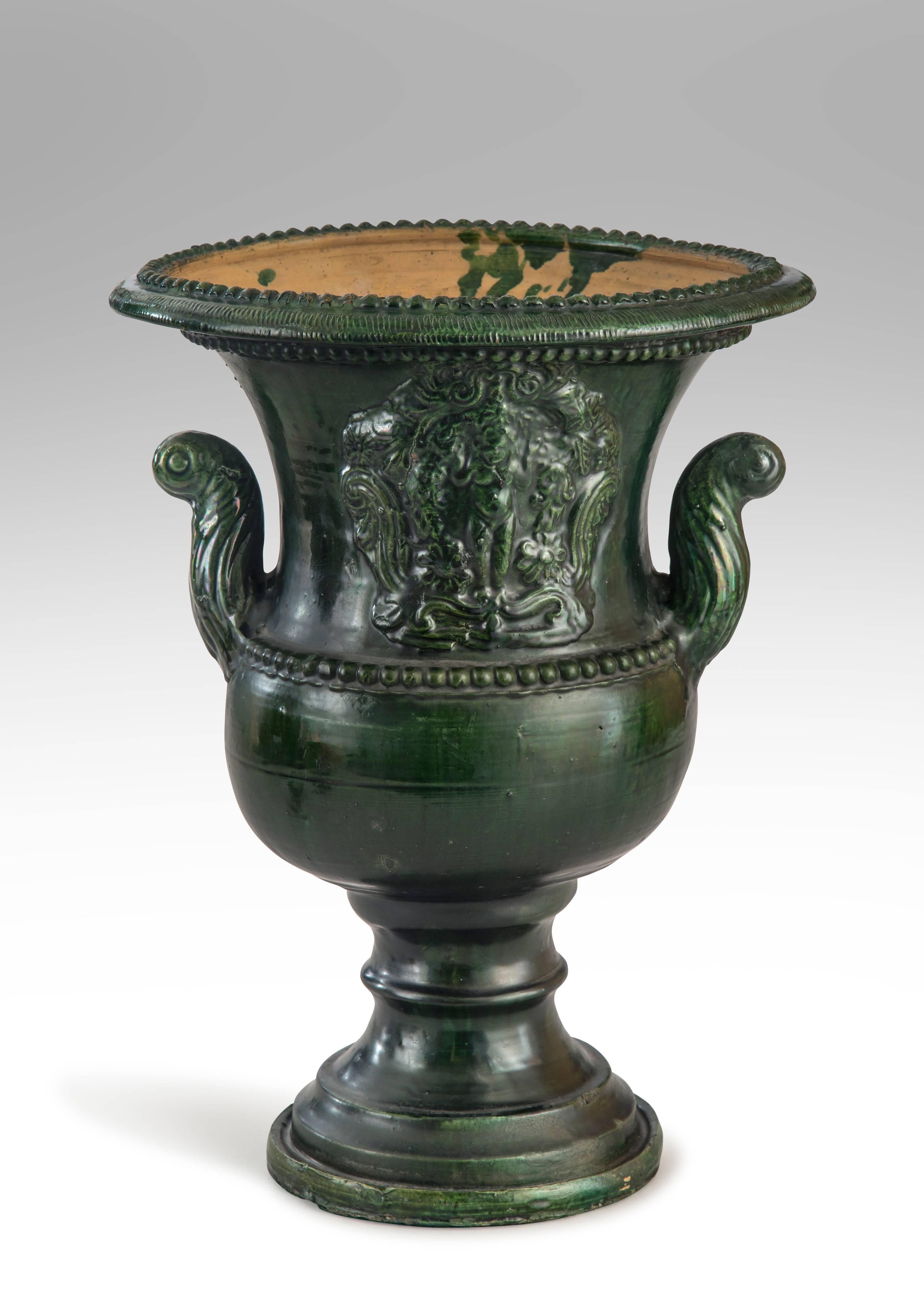 Neoclassical A French Green Glazed Faience Campana Urn with Classical Relief For Sale