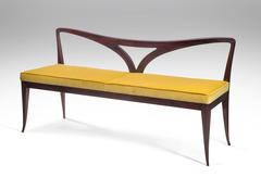Paolo Buffa, An Italian Upholstered and Mahogany Sofa / Bench