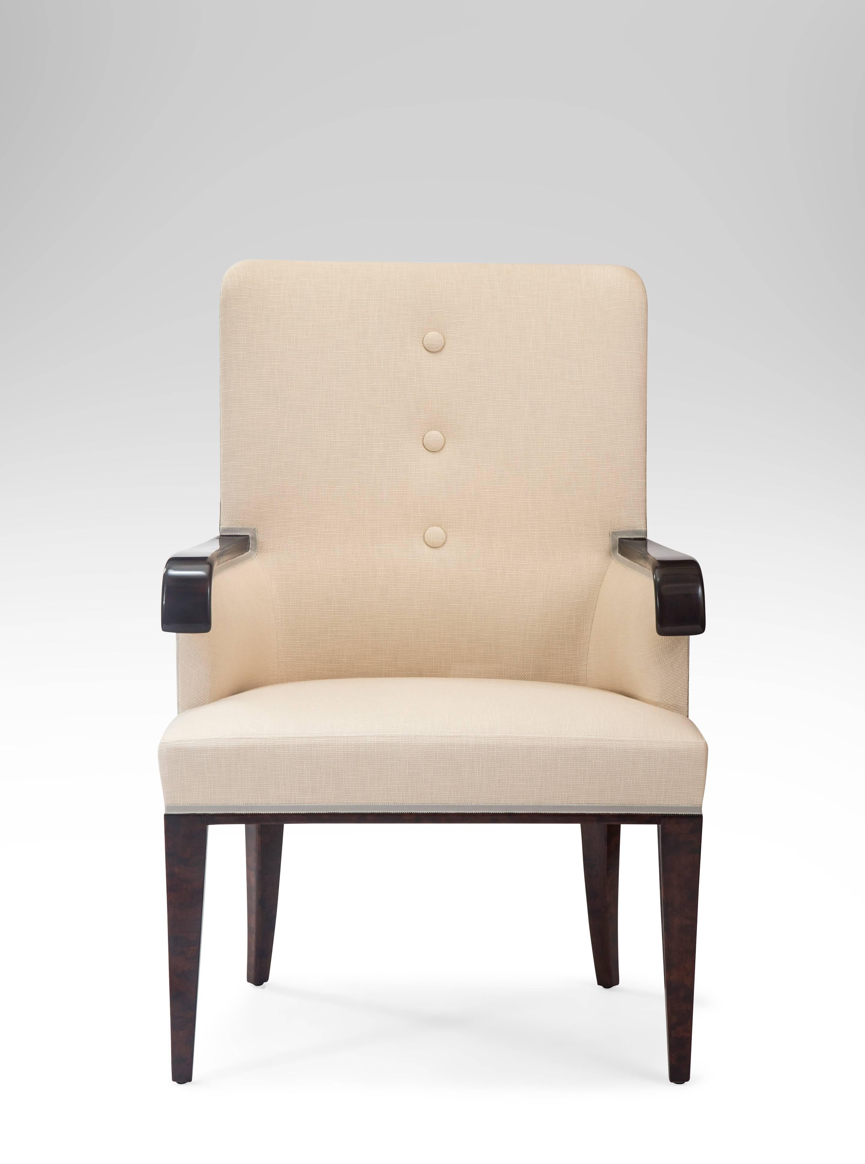 Nice big, comfortable chair with lots of style. The upholstered concave backrest, issuing down-swept birch armrests, flanking an upholstered seat, raised on square tapering front and saber back legs. 

Professionally restored, very good condition,