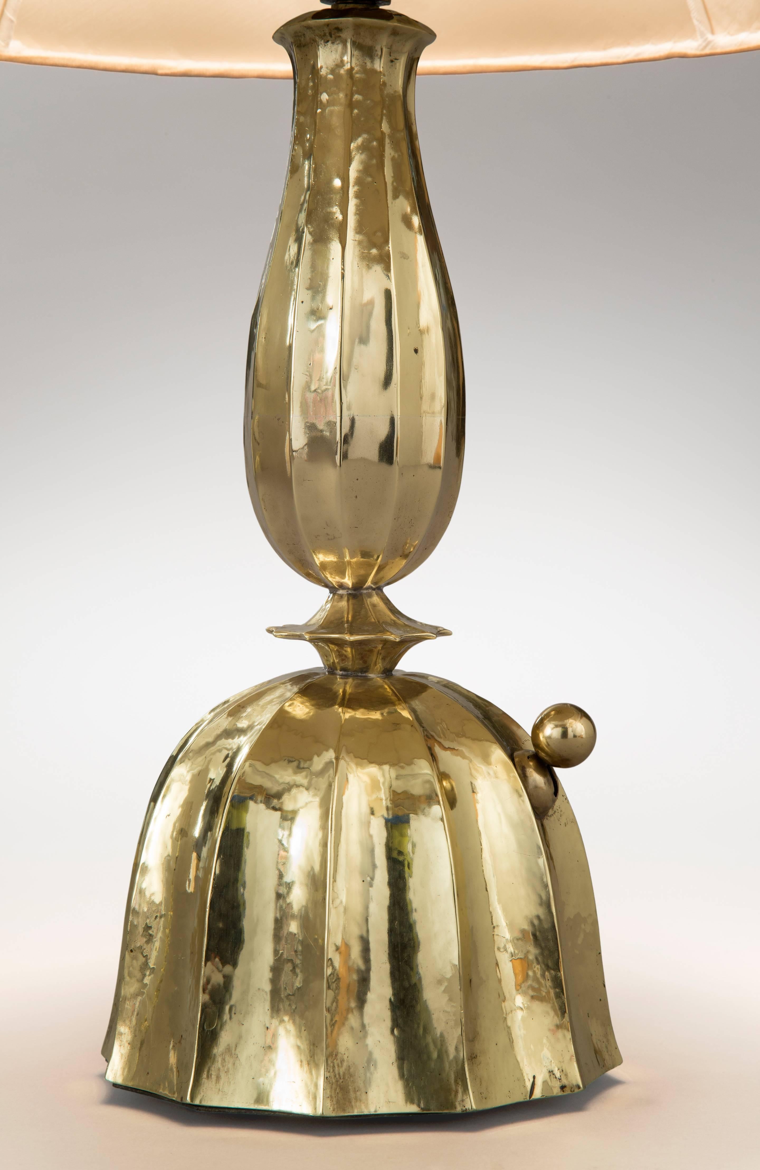 Josef Hoffmann for the Wiener Werkestätte, Pair of Hammered Brass Table Lamps, Vienna Secession 
A very hard to find pair of museum quality lamps by the founder of the Wiener Werkstätte. The baluster-shaped standard, above a pinched waist centering