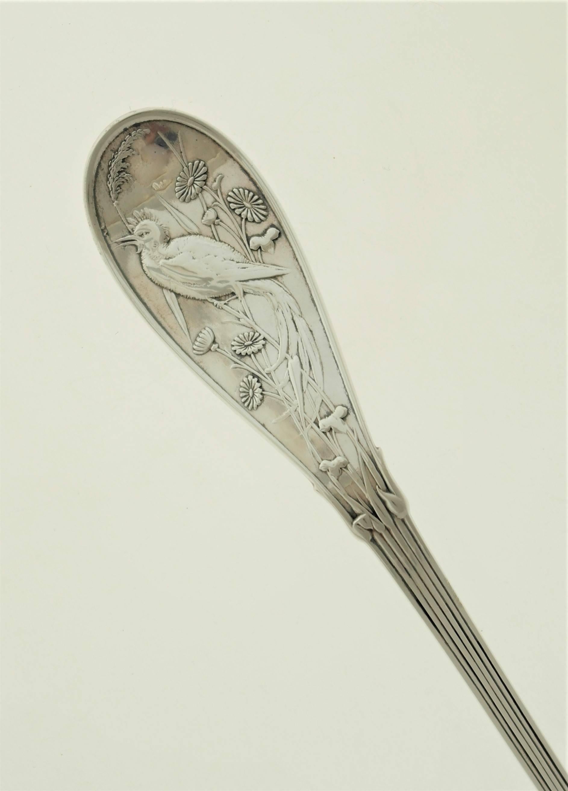 A circa 1871 sterling silver ladle made by Tiffany & Company of New York. Ladle handle with bird in low relief. Dimensions 10 1/2 inches long; bowl is 3 inches wide by 3 inches deep. In excellent condition.