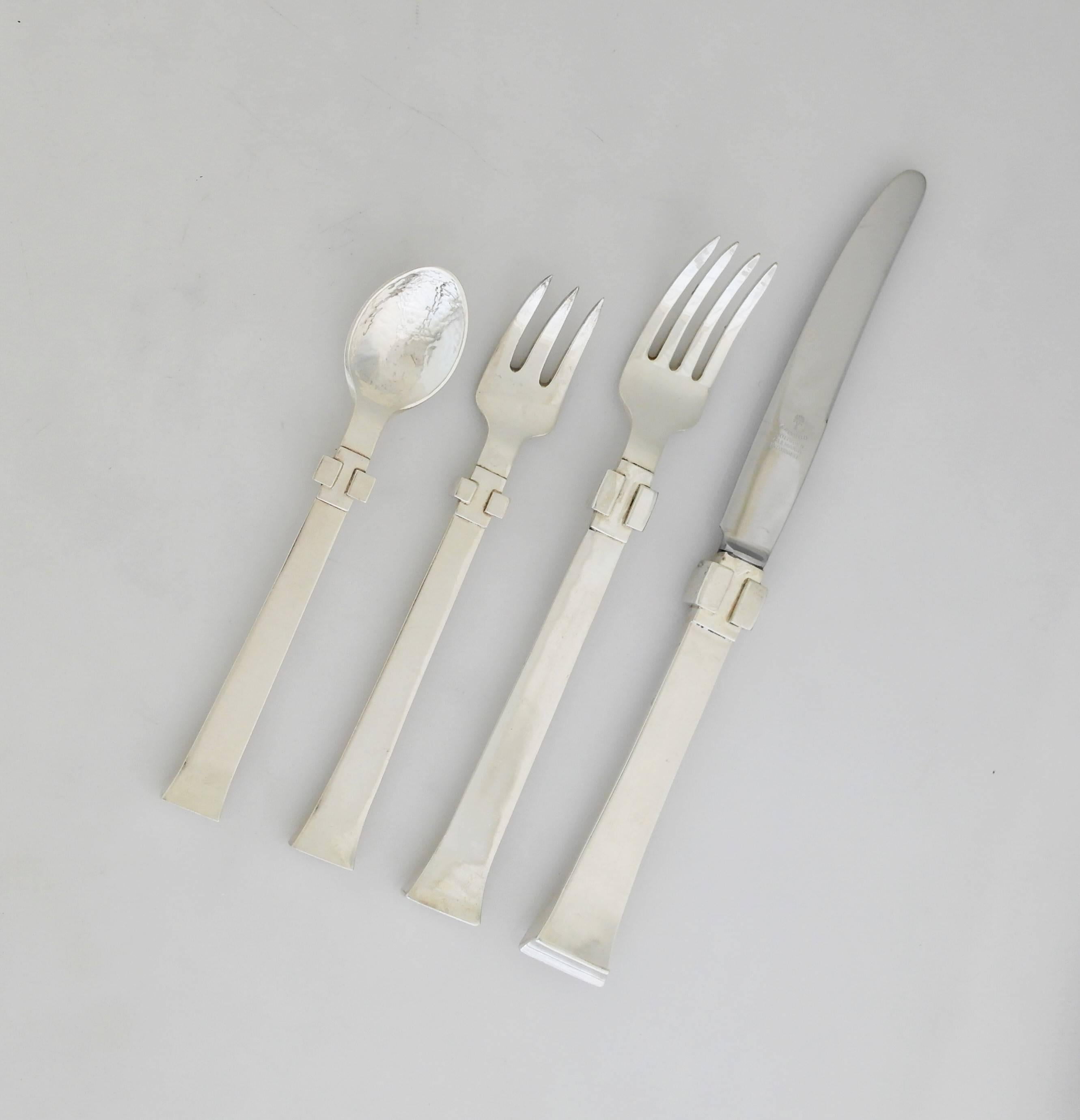 Being offered is a circa 1950 sterling silver flatware set by Antonio Pineda of Taxco, Mexico. Incredible flatware set comprising four piece place setting for eight, including the following:

Knife - 9 3/4