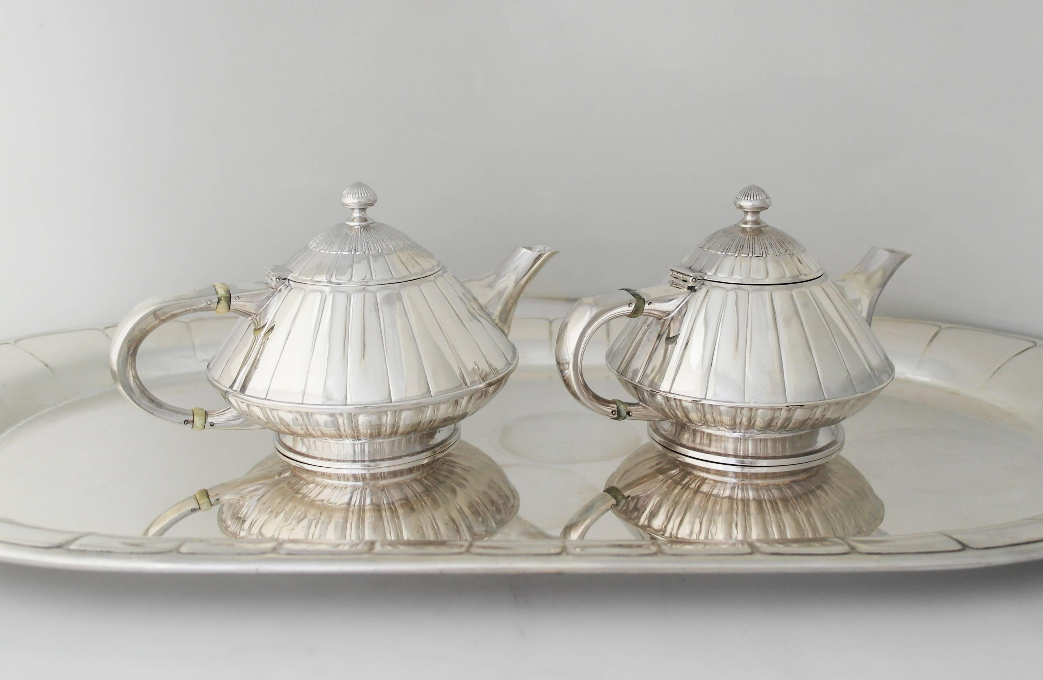 SUPERB Museum Quality ART DECO Sterling Silver Tea and Coffee Set, circa 1928 In Excellent Condition For Sale In New York, NY
