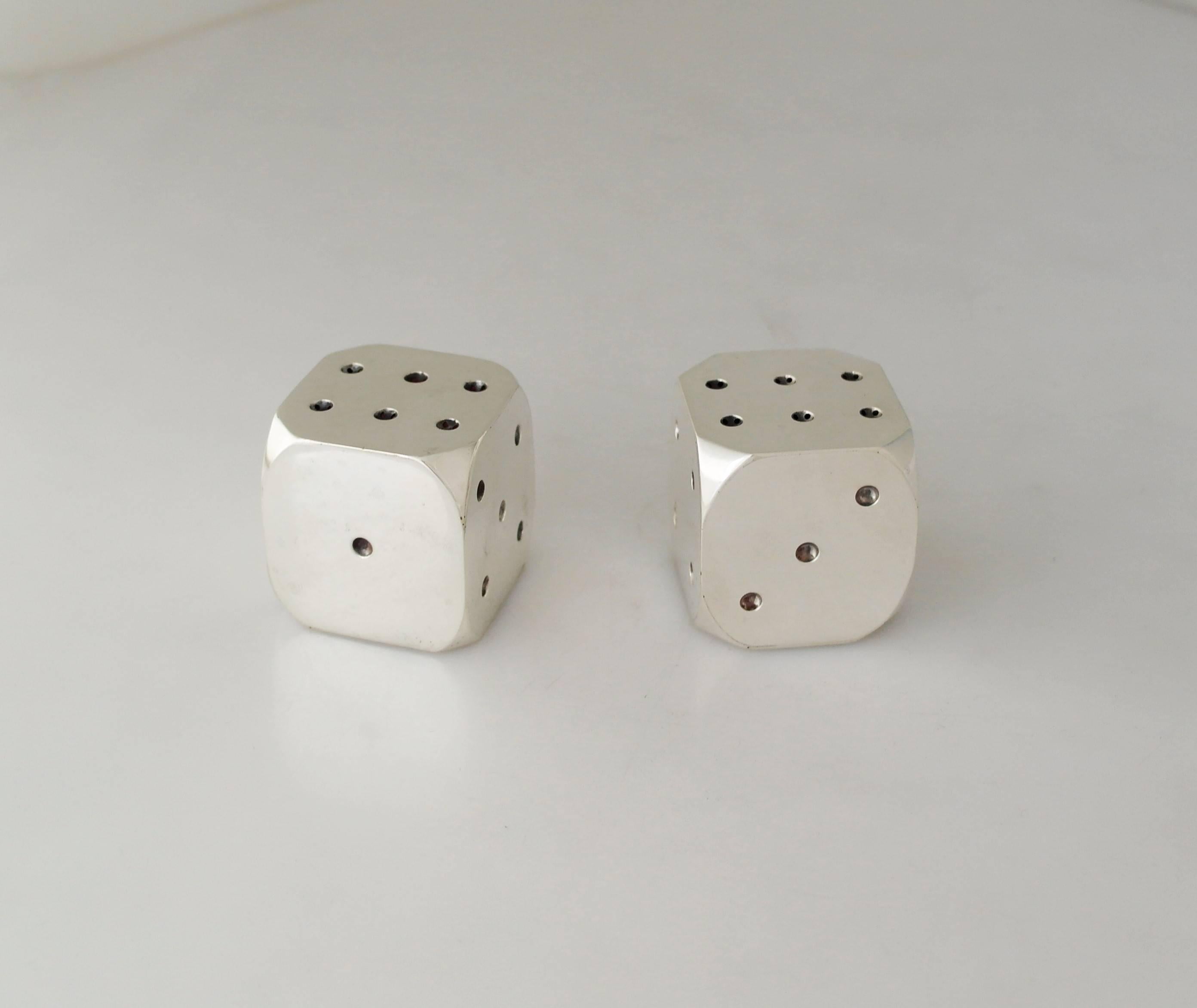 Being offered are a pair of exceedingly rare circa 1967 .930 silver (better than sterling) salt and pepper shakers by Antonio Pineda of Taxco, Mexico. Incredible pair of shakers, of heavy gauge silver, in the form of dice. Dimensions: 1 7/8