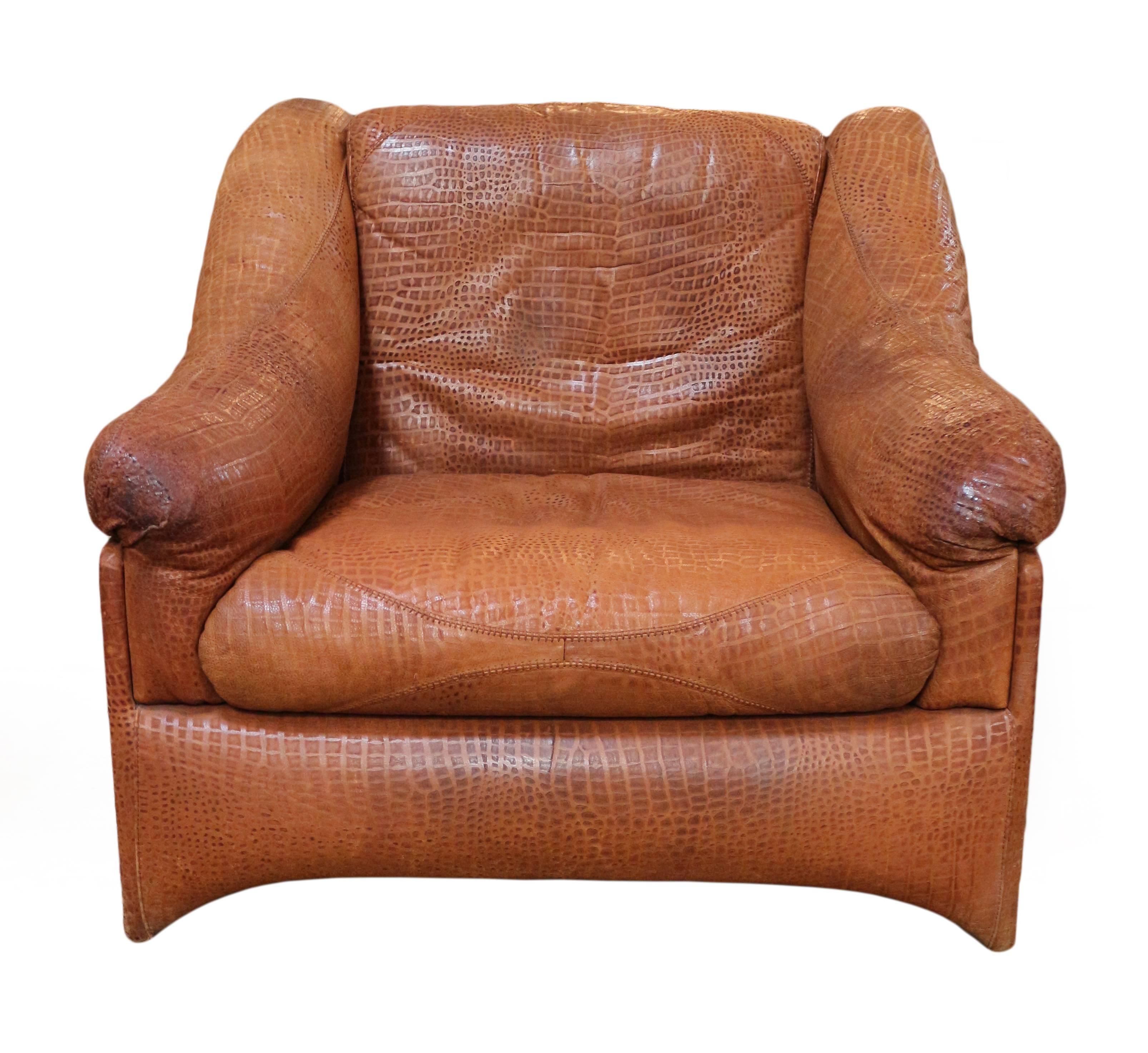 Pair of Valenti leather armchairs.