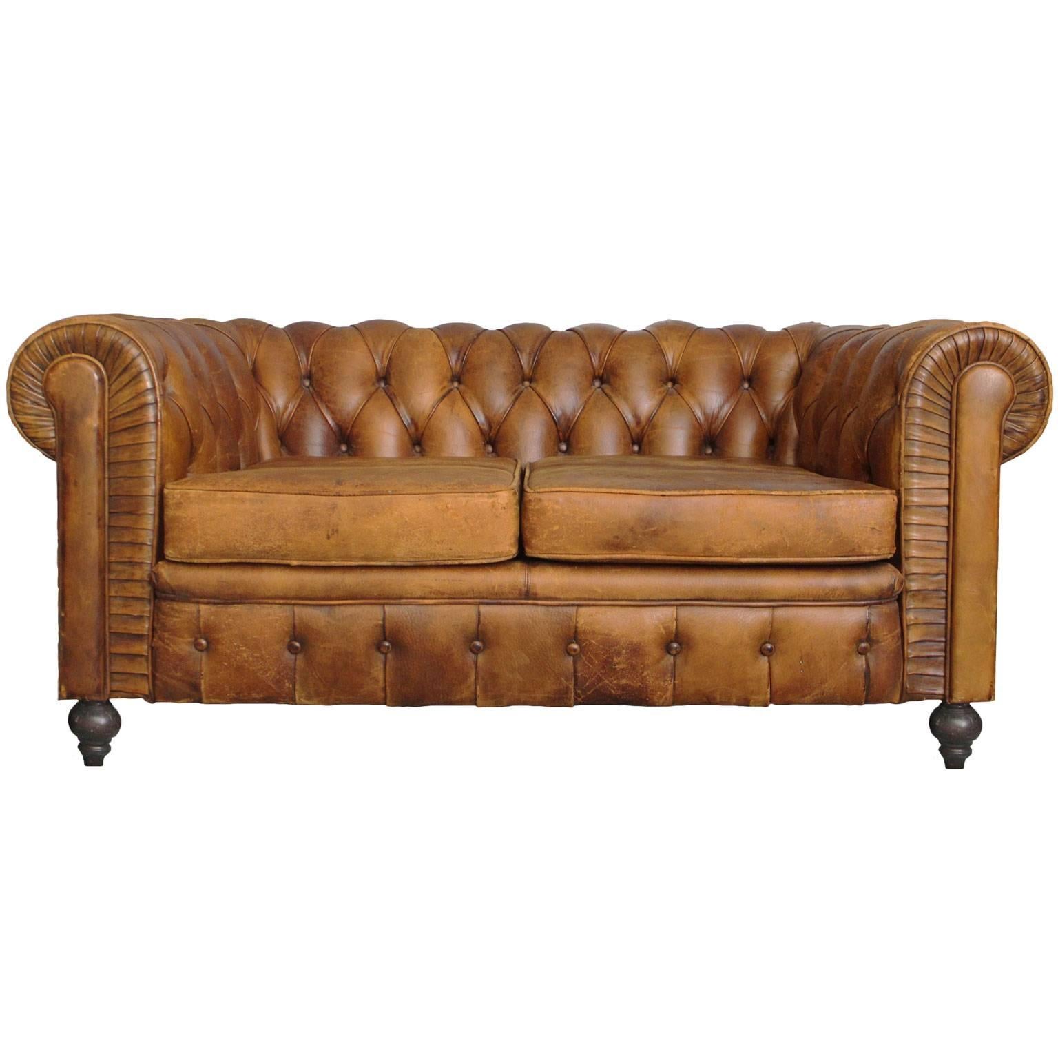 Leather Chesterfield loveseat.