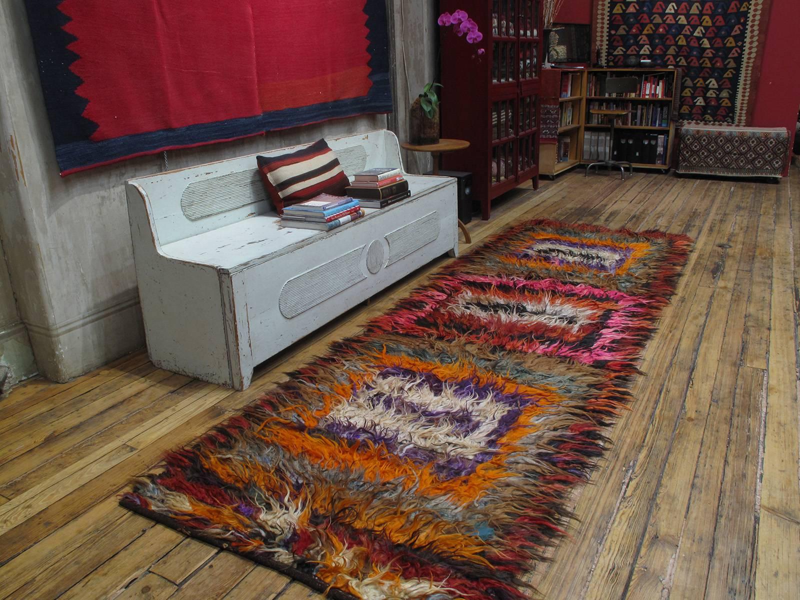 A distinct type of shaggy tribal rug from Southeastern Turkey, woven with a mixture of angora and wool in long strands, featuring a characteristic design of concentric squares. Such rugs we used as seat covers on long wooden benches called 