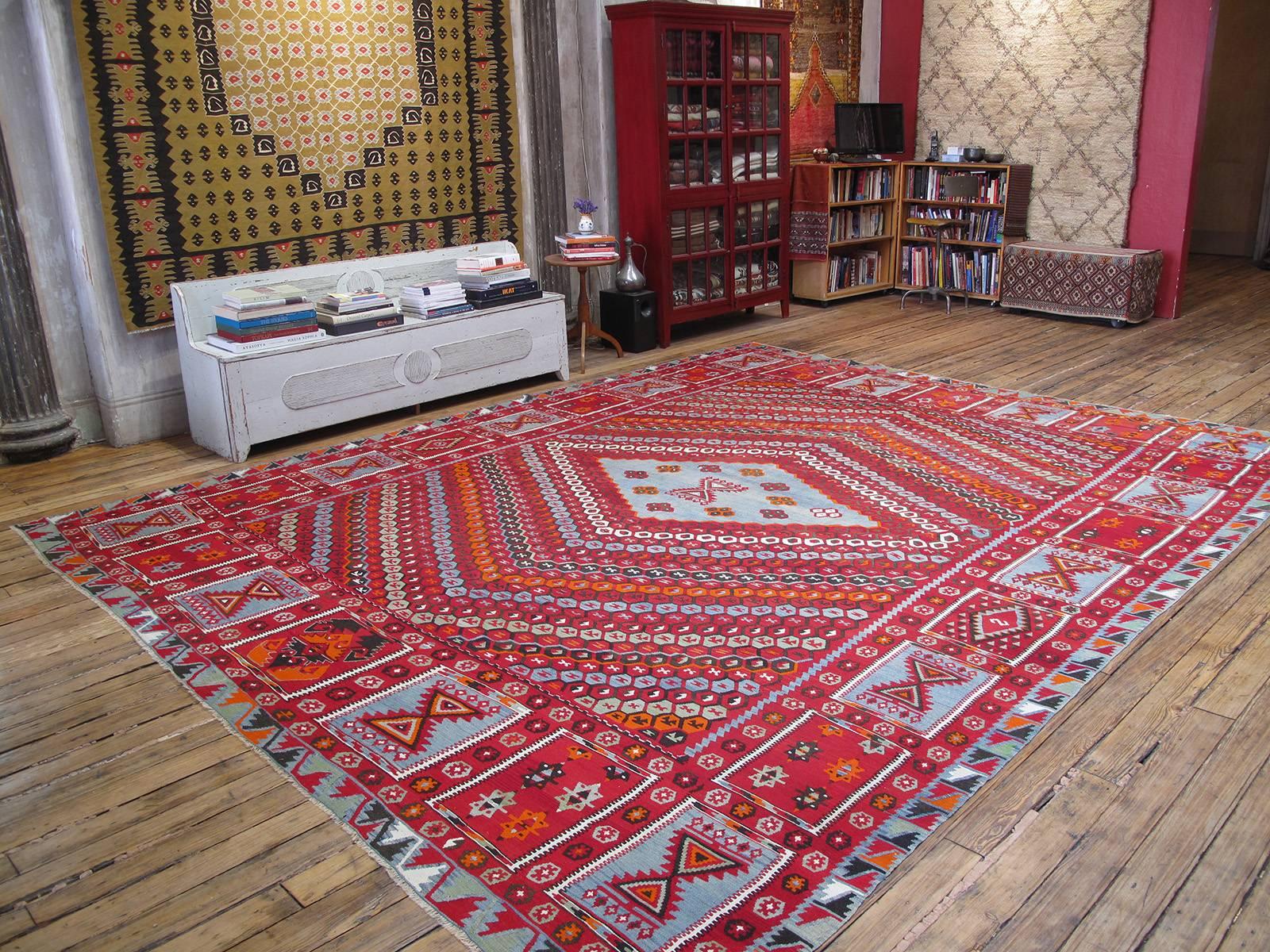 Superb antique Sharkisla Kilim rug. A great example of large-format Kilim rug weaving tradition from this prolific region, with a refined rendition of the so-called honeycomb design and a rare border. Rug is in excellent, almost unused, condition