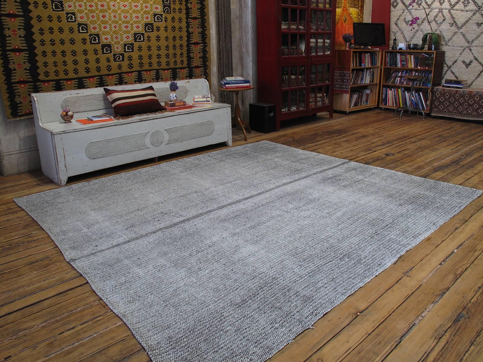 An old tribal flat-weave from Southeastern Turkey, woven for everyday utilitarian use, with an ingenious mixture of goat hair and cotton. Surprisingly elegant with great Modern / Minimalist appeal. Unusually wide and square-ish format.