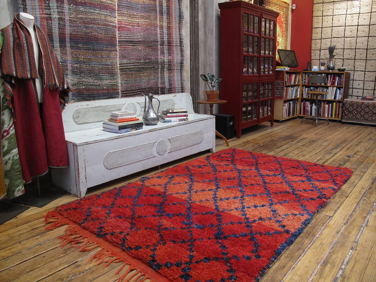 Simple and elegant with an incredibly inviting color palette, it takes a while to appreciate this is no ordinary Berber rug. A brilliant example attributed to the Ait Sgougou of the Middle Atlas Mountains of Morocco. The rich indigo color is an
