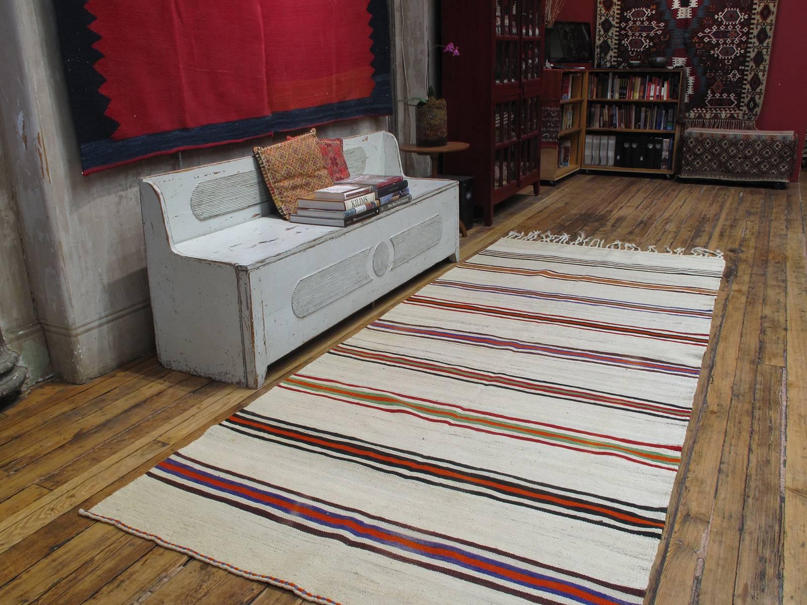 Banded Kilim wide runner rug. A very good example of this type of runner rug with brilliant colors. Very well preserved with complete original ends.